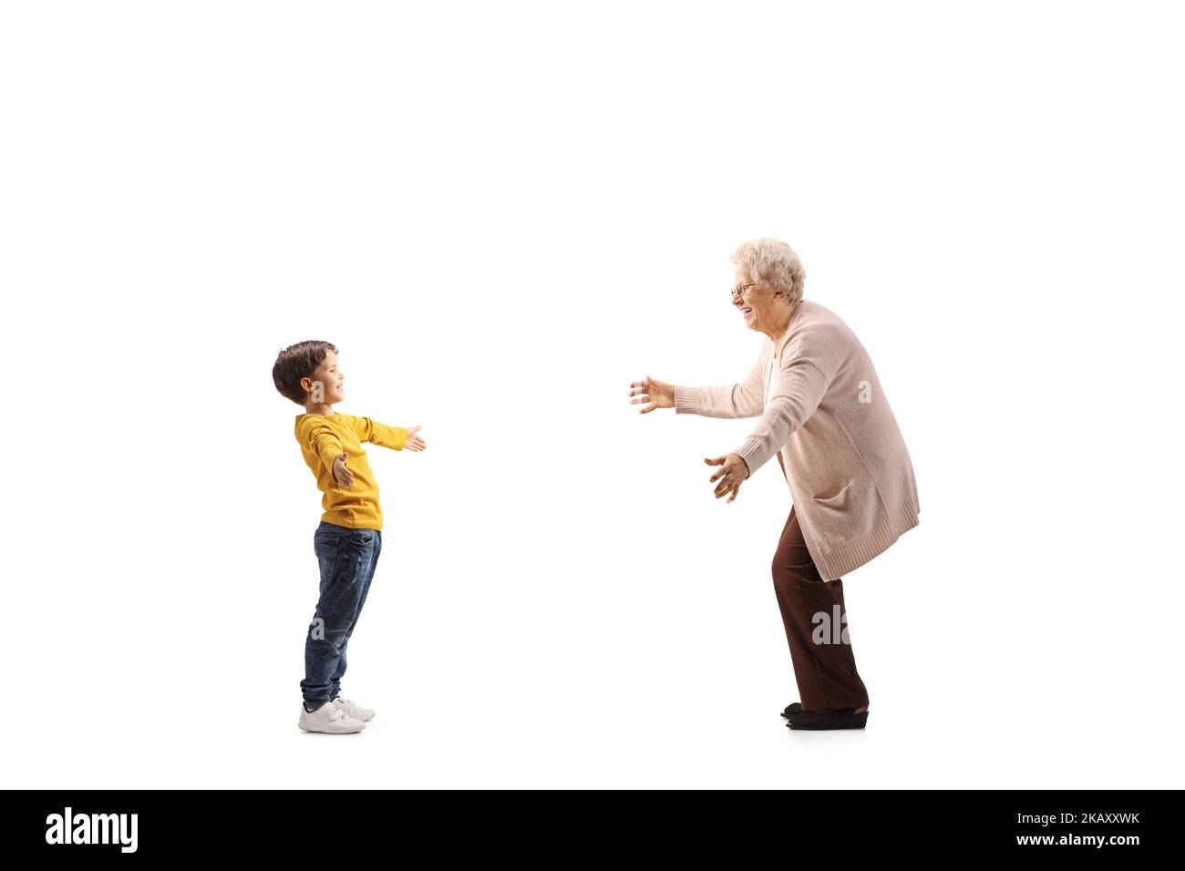 Happy grandmother waiting to hug her grandson isolated on white ...