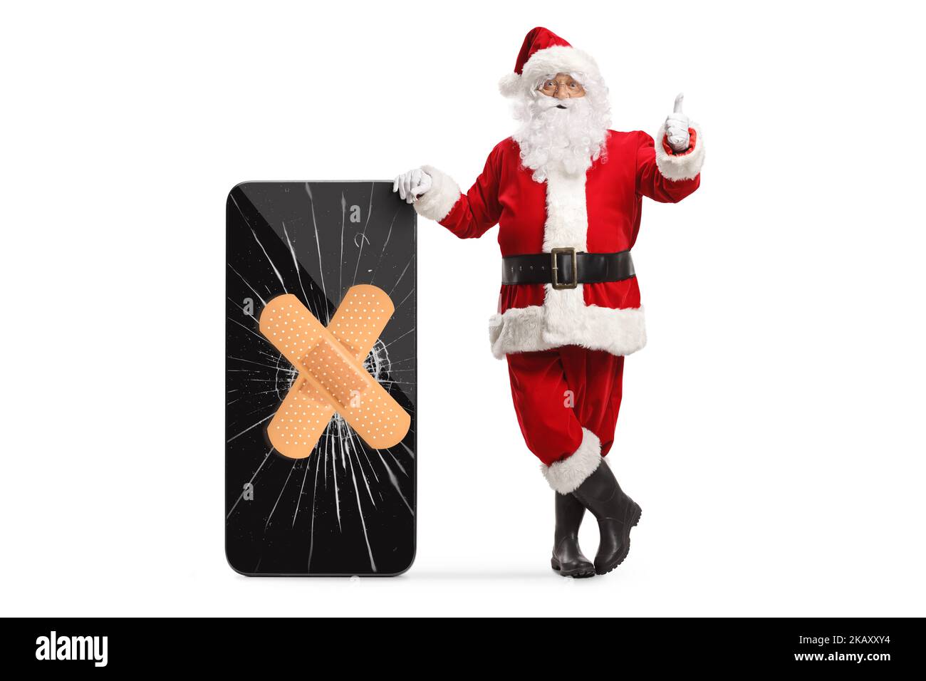 Santa claus leaning on a smartphone with a broken screen and showing ...