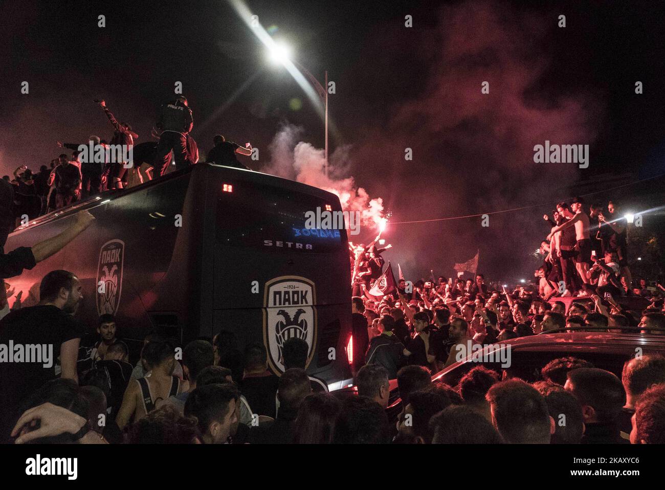 PAOK FC, the football team based in Thessaloniki, Greece, won on May 12, 2018 in Athens, inside the Olympic stadium playing with opponent team AEK. There have been some incidents during, before and after the game. In Thessaloniki everything was powerful. People welcomed the team on the bus with the cup in front of the city's landmark, The White Tower. Among the people was Ivan Savvidis, a Russian businessman who is forbidden to enter for 2 years in the greek stadiums. (Photo by Nicolas Economou/NurPhoto) Stock Photo