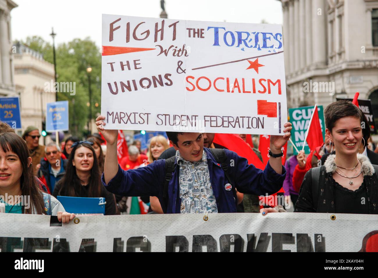 Students take part at a demonstration organised by the Trades Union Congress (TUC) calling for a new deal for working people in central London on May 12, 2018. - The TUC called for a national demonstration on May 12 to demand an end to the government's austerity policies and better rights for all in the workplace. (Photo by Alex Cavendish/NurPhoto) Stock Photo