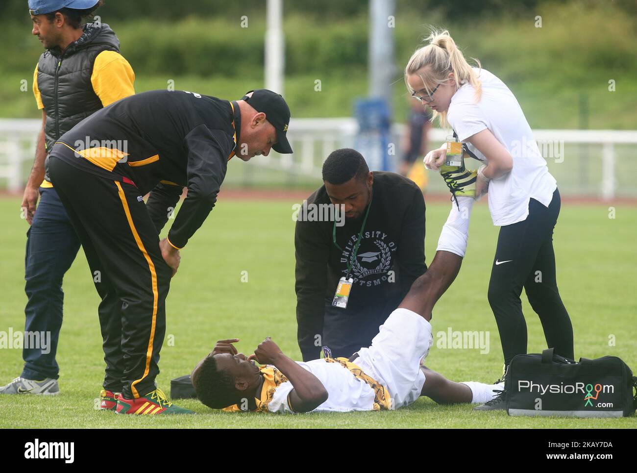 Romeo Sibanda of Mtabeleland getting treatment from Bruce Grobbelaar during Conifa Paddy Power World Football Cup 2018 Quarterfinal B for Places 9-16 match between Matabeleland against Kabylia at Queen Elizabeth II Stadium (Enfield Town FC), London, on 05 June 2018 (Photo by Kieran Galvin/NurPhoto)  Stock Photo