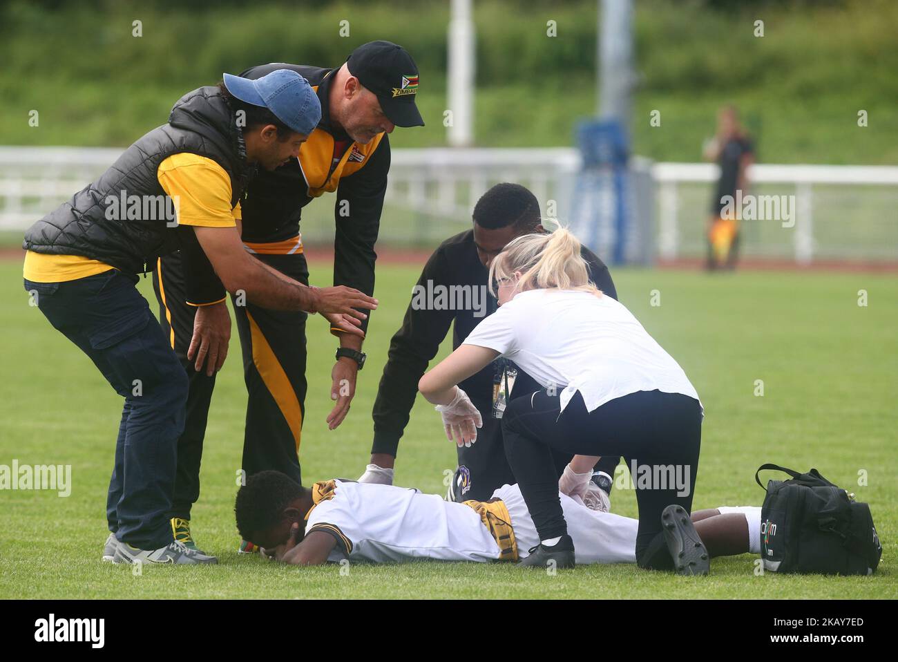 Romeo Sibanda of Mtabeleland getting treatment from Bruce Grobbelaar during Conifa Paddy Power World Football Cup 2018 Quarterfinal B for Places 9-16 match between Matabeleland against Kabylia at Queen Elizabeth II Stadium (Enfield Town FC), London, on 05 June 2018 (Photo by Kieran Galvin/NurPhoto)  Stock Photo