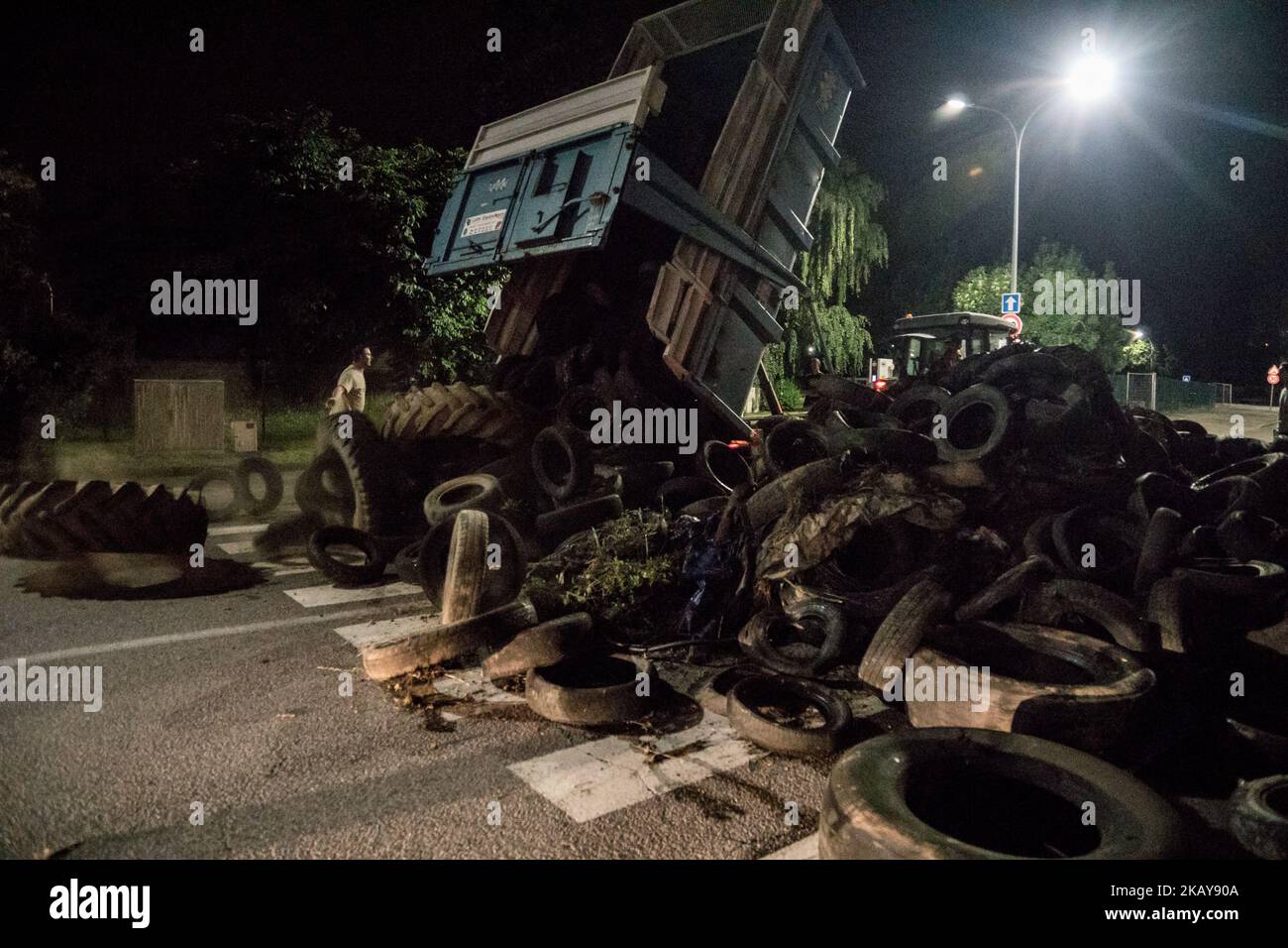 Blockade of the fuel depot Edouard Herriot port by farmers FNSEA and Young Farmers in Lyon, France, June 11, 2018. Protesters are against the revision of European financial aid, as well as against the massive importation of palm oil. Several refineries and fuel depots were blocked for a period of three days. (Photo by Nicolas Liponne/NurPhoto) Stock Photo