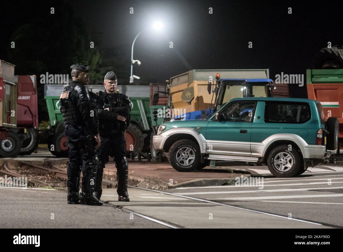 Blockade of the fuel depot Edouard Herriot port by farmers FNSEA and Young Farmers in Lyon, France, June 11, 2018. Protesters are against the revision of European financial aid, as well as against the massive importation of palm oil. Several refineries and fuel depots were blocked for a period of three days. (Photo by Nicolas Liponne/NurPhoto) Stock Photo