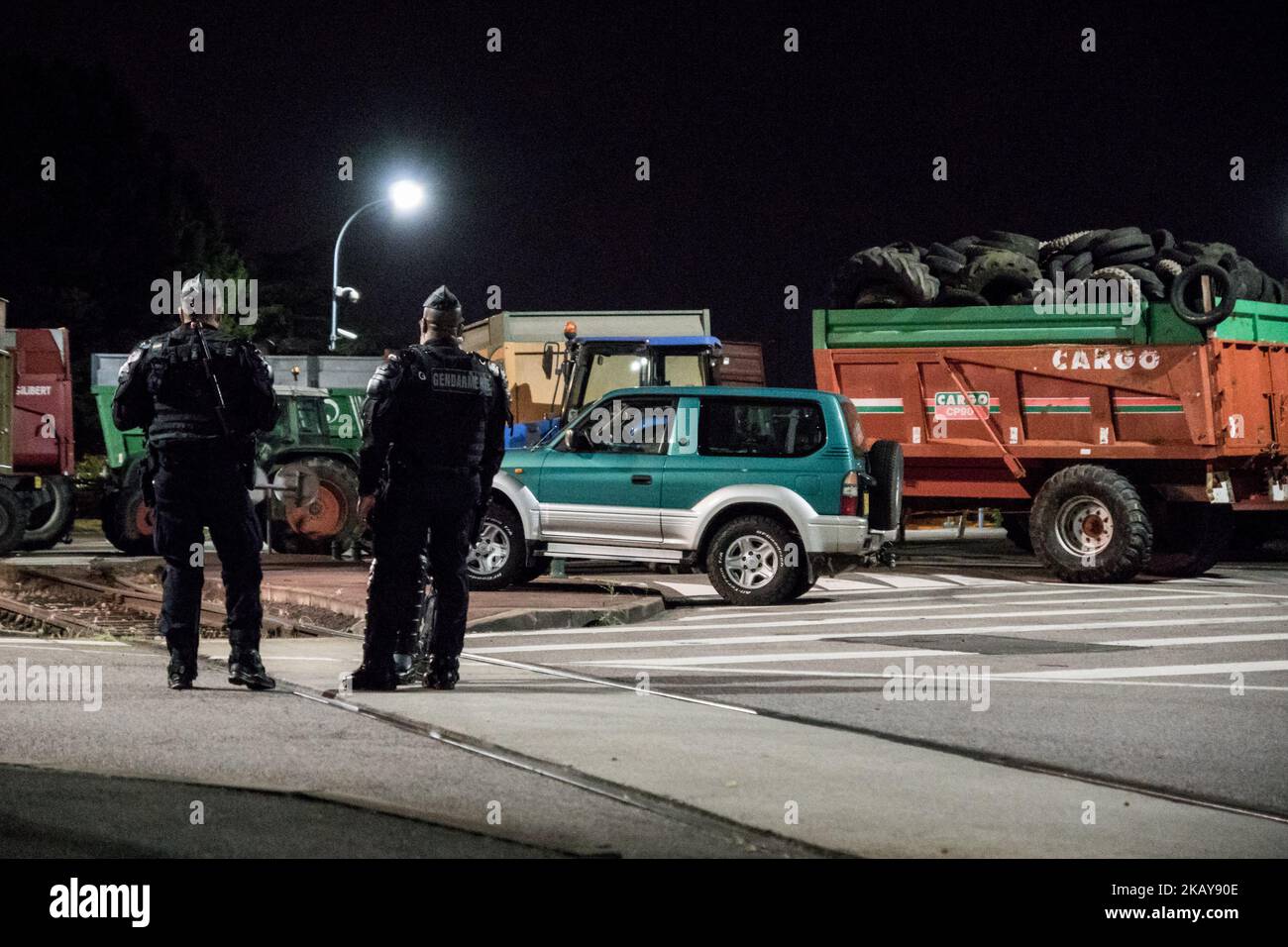 Blockade of the fuel depot Edouard Herriot port by farmers FNSEA and Young Farmers in Lyon, France, June 11, 2018. Protesters are against the revision of European financial aid, as well as against the massive importation of palm oil. Several refineries and fuel depots were blocked for a period of three days. (Photo by Nicolas Liponne/NurPhoto) Stock Photo