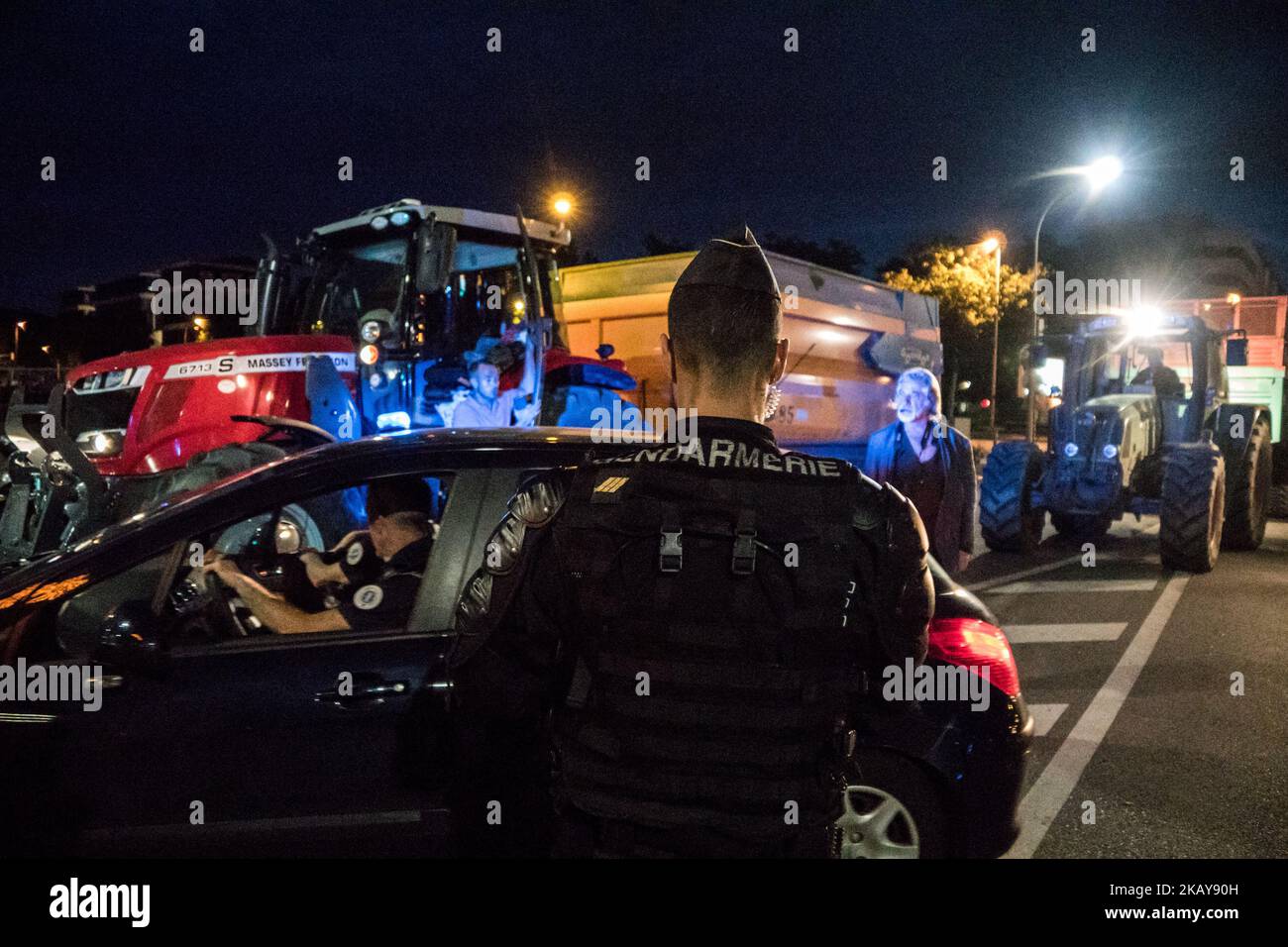 Blockade of the fuel depot Edouard Herriot port by farmers FNSEA and Young Farmers in Lyon, France, June 11, 2018. Protesters are against the revision of European financial aid, as well as against the massive importation of palm oil. Several refineries and fuel depots were blocked for a period of three days. (Photo by Nicolas Liponne/NurPhoto) Stock Photo