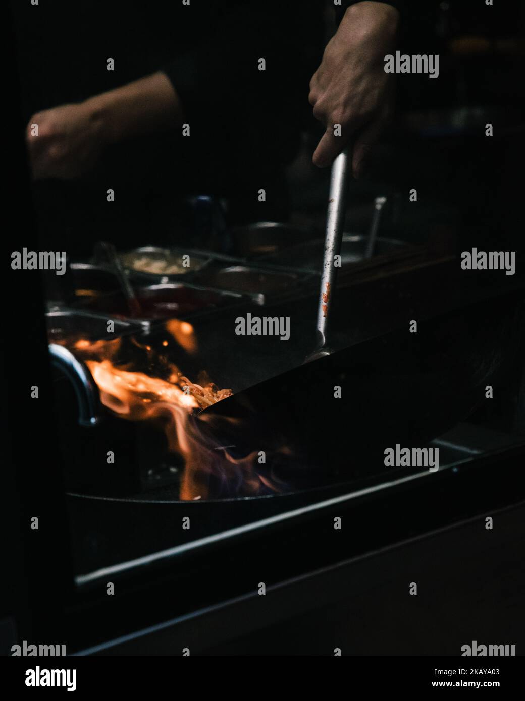 The vertical view of flames during cooking process - food industry ...