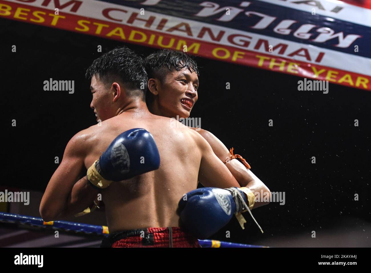 Tulek (THAILAND - Blue) wins his Thai boxing international combat against Aahuang Sitwungluang (CHINA - Red), in -60kg category, during Muaythai Monday Evening International Thai Boxing Gala in Thaphae Stadium in Chiang Mai. On Monday, June 11, 2018, Chiang Mai, Chiang Mai Province, Thailand. (Photo by Artur Widak/NurPhoto)  Stock Photo