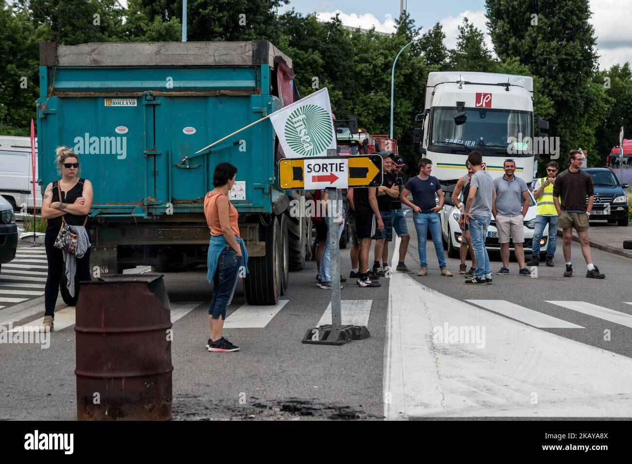 Blockade of the fuel depot Edouard Herriot port by farmers FNSEA and Young Farmers in Lyon, France, June 12, 2018. Protesters are against the revision of European financial aid, as well as against the massive importation of palm oil. Several refineries and fuel depots were blocked for a period of three days. (Photo by Nicolas Liponne/NurPhoto) Stock Photo