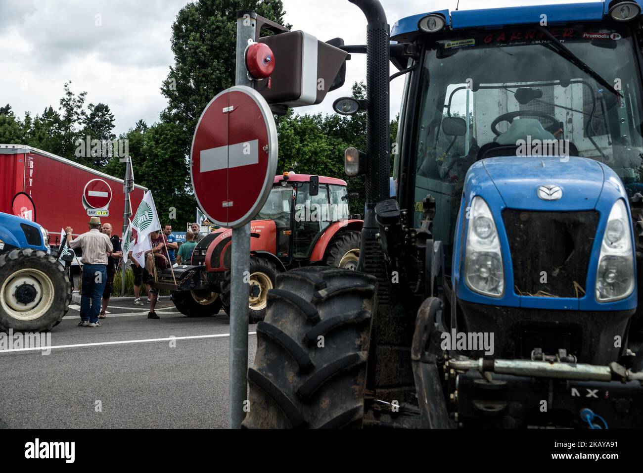 Blockade of the fuel depot Edouard Herriot port by farmers FNSEA and Young Farmers in Lyon, France, June 12, 2018. Protesters are against the revision of European financial aid, as well as against the massive importation of palm oil. Several refineries and fuel depots were blocked for a period of three days. (Photo by Nicolas Liponne/NurPhoto) Stock Photo