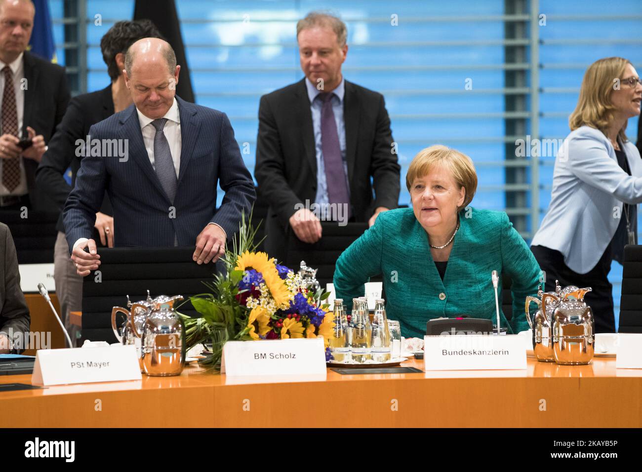 German Chancellor Angela Merkel (C-R) and Finance Minister Olaf Scholz (C-L) take place prior to a meeting between Government and Prime Ministers of the German States (Laender) at the Chancellery in Berlin, Germany on June 14, 2018. (Photo by Emmanuele Contini/NurPhoto) Stock Photo