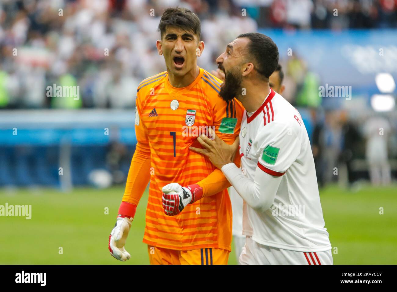 Ali Beiranvand (L) and Roozbeh Cheshmi of IR Iran national team celebrate victory during the 2018 FIFA World Cup Russia Group B match between Morocco and IR Iran on June 15, 2018 at Saint Petersburg Stadium in Saint Petersburg, Russia. (Photo by Mike Kireev/NurPhoto) Stock Photo