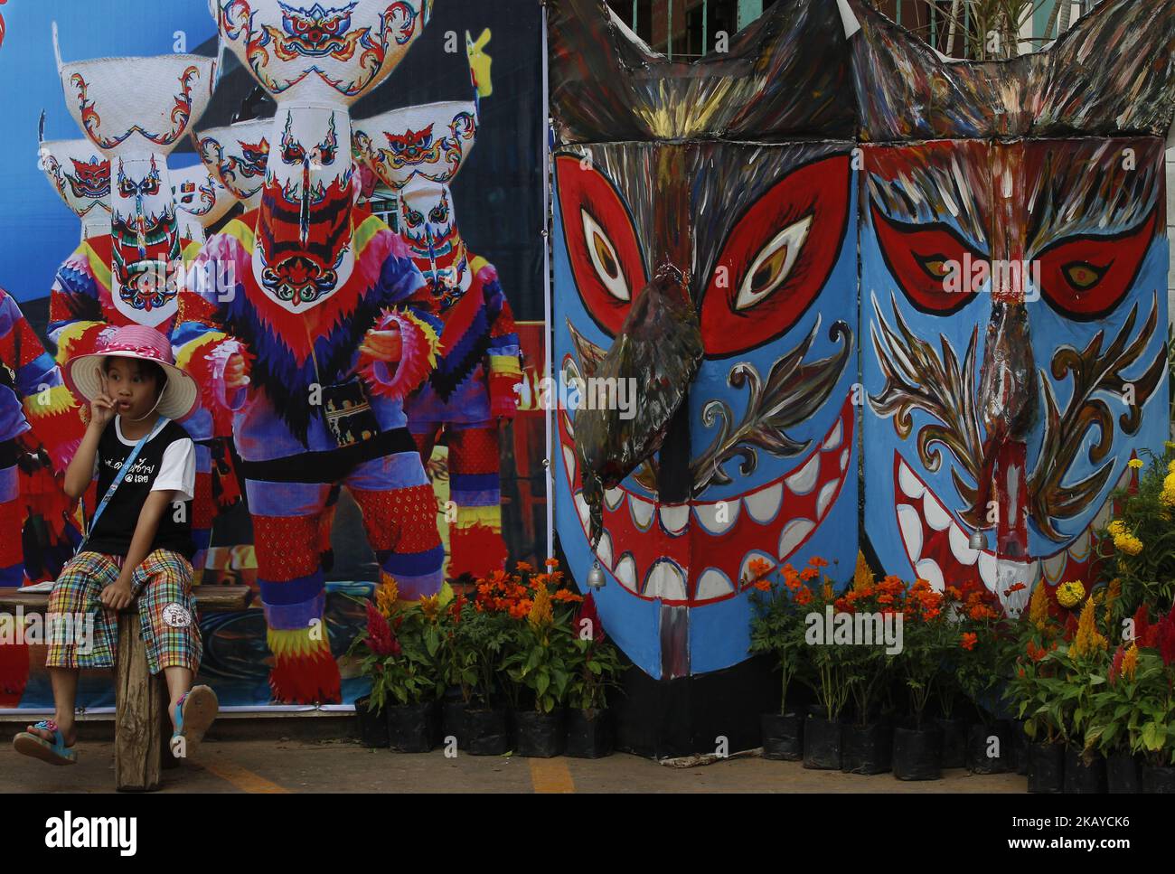 A man posed with the puppet are wear masks representing the spirits of the dead springing back to life during the annual Phi Ta Khon, or Ghost festival in Dan Sai, Loei province, northeast of Bangkok on June 16, 2018. The event was held to promote tourism in Thailand.during (Photo by Chaiwat Subprasom/NurPhoto) Stock Photo