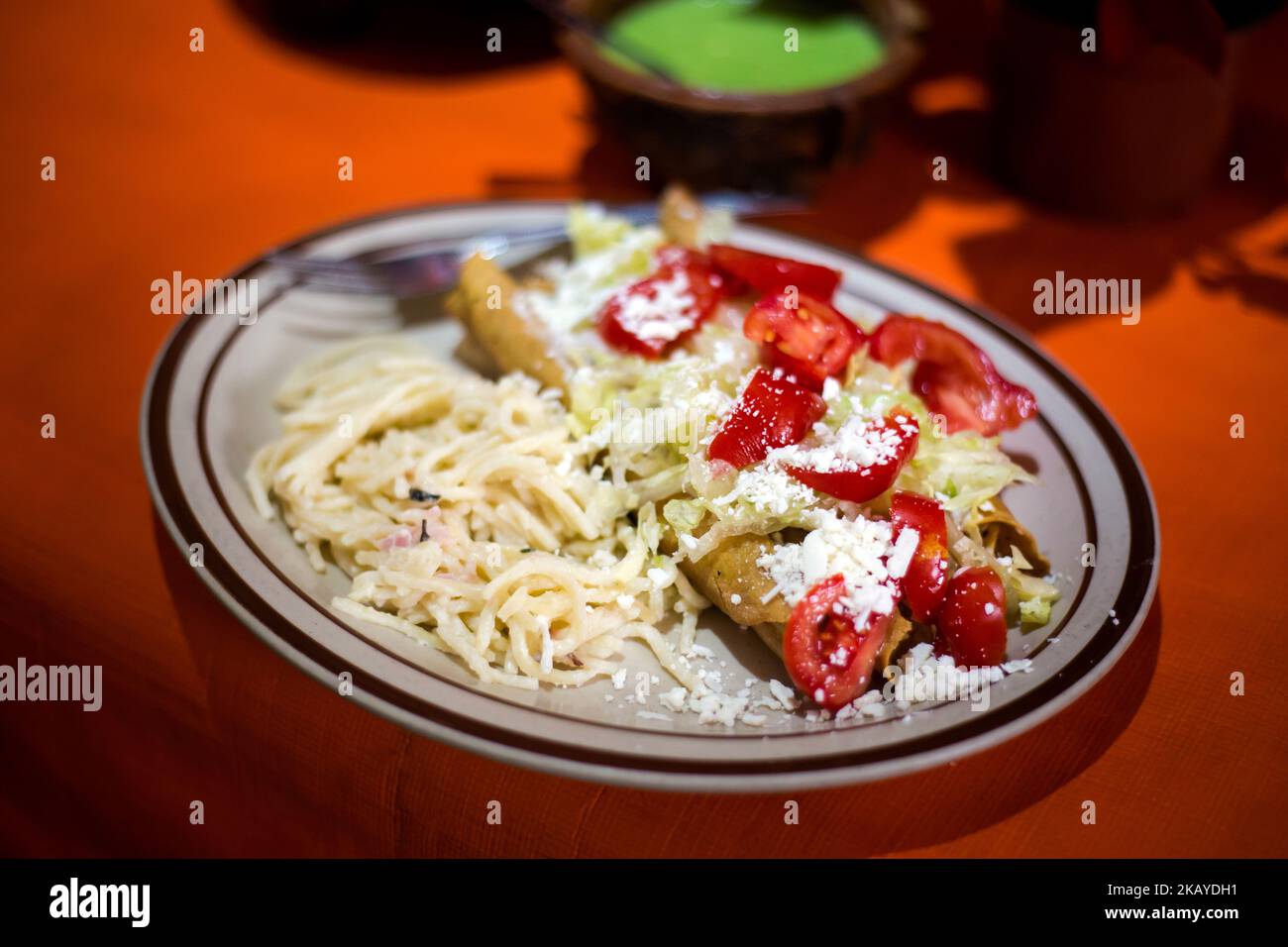 Fresh prepared flautas, taquitos . Traditional mexican cuisine made of