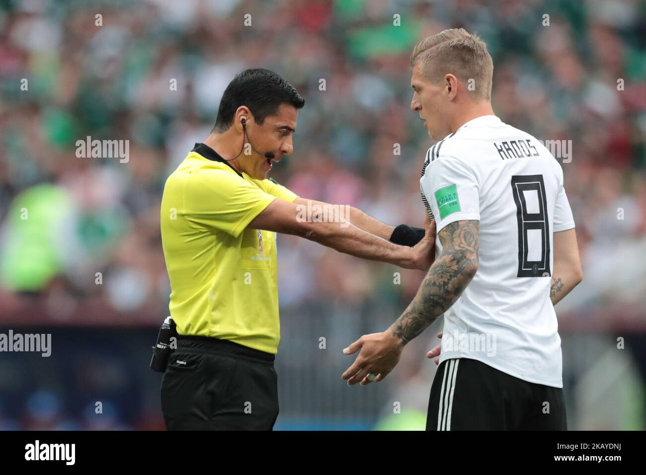 Referee Alireza Faghani and midfielder Toni Kroos of Germany National team during the group F match between Germany and Mexico at the 2018 soccer World Cup at Luzhniki stadium in Moscow, Russia, Sunday, June 17, 2018. (Photo by Anatolij Medved/NurPhoto) Stock Photo