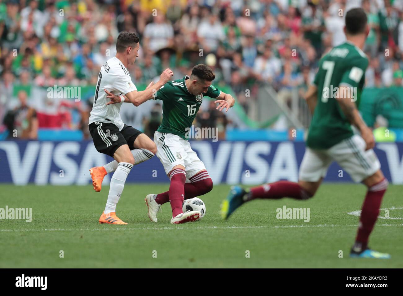 midfielder Julian Draxler of Germany National team and defender Hector Herrera of Mexico National team during the group F match between Germany and Mexico at the 2018 soccer World Cup at Luzhniki stadium in Moscow, Russia, Sunday, June 17, 2018. (Photo by Anatolij Medved/NurPhoto) Stock Photo