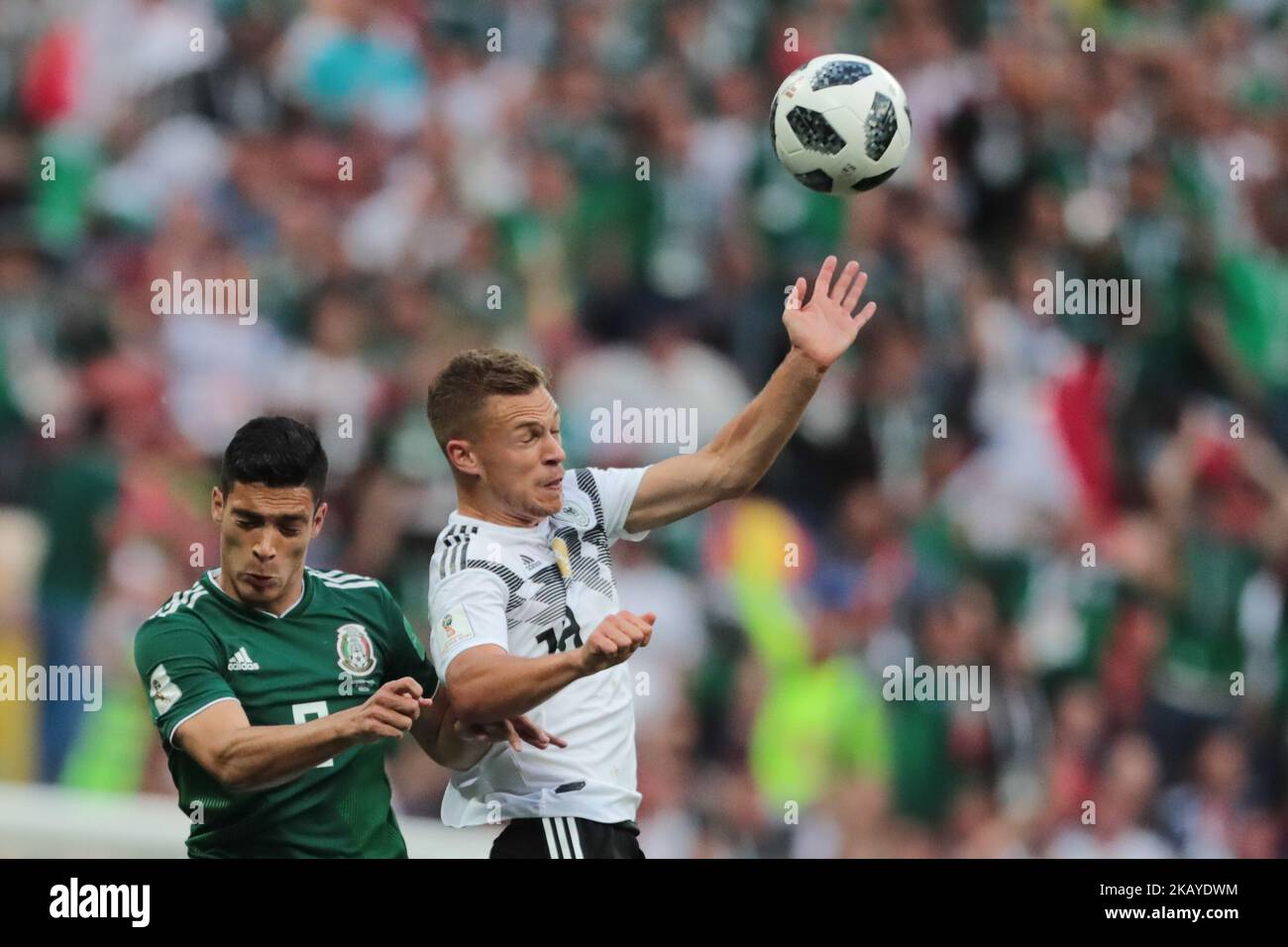 forward Marco Fabian of Mexico National team and defender Joshua Kimmich of Germany National team during a Group F 2018 FIFA World Cup soccer match between Germany and Mexico on June 16, 2018, at the Kazan Arena in Kazan, Russia. (Photo by Anatolij Medved/NurPhoto) Stock Photo
