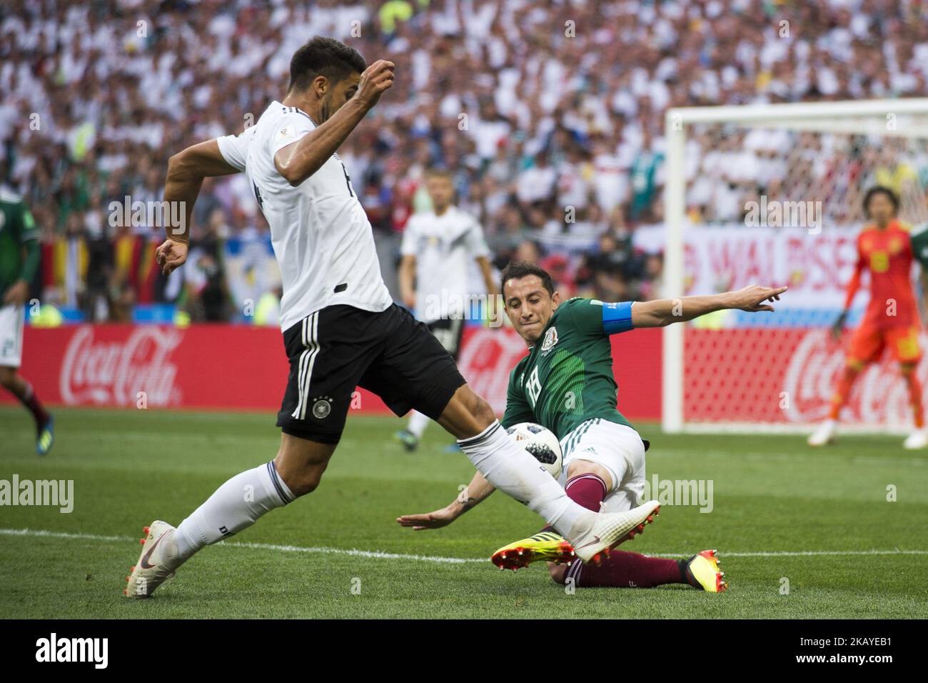 Sami Khedira of Germany and Andres Guardado of Mexico during the 2018 FIFA World Cup Russia Group F match between Germany and Mexico at Luzhniki Stadium in Moscow, Russia on June 17, 2018 (Photo by Andrew Surma/NurPhoto) Stock Photo