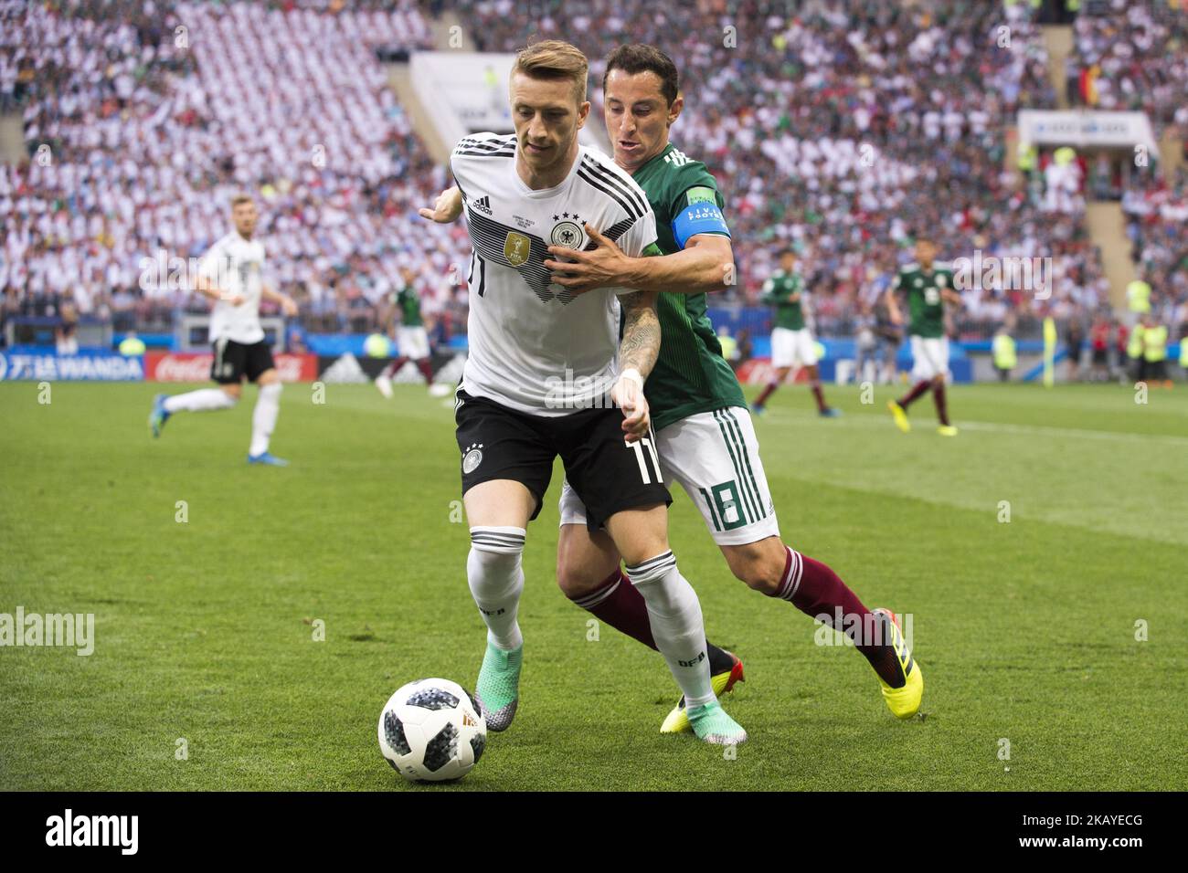 Marco Reus of Germany and Andres Guardado of Mexico during the 2018 FIFA World Cup Russia Group F match between Germany and Mexico at Luzhniki Stadium in Moscow, Russia on June 17, 2018 (Photo by Andrew Surma/NurPhoto) Stock Photo