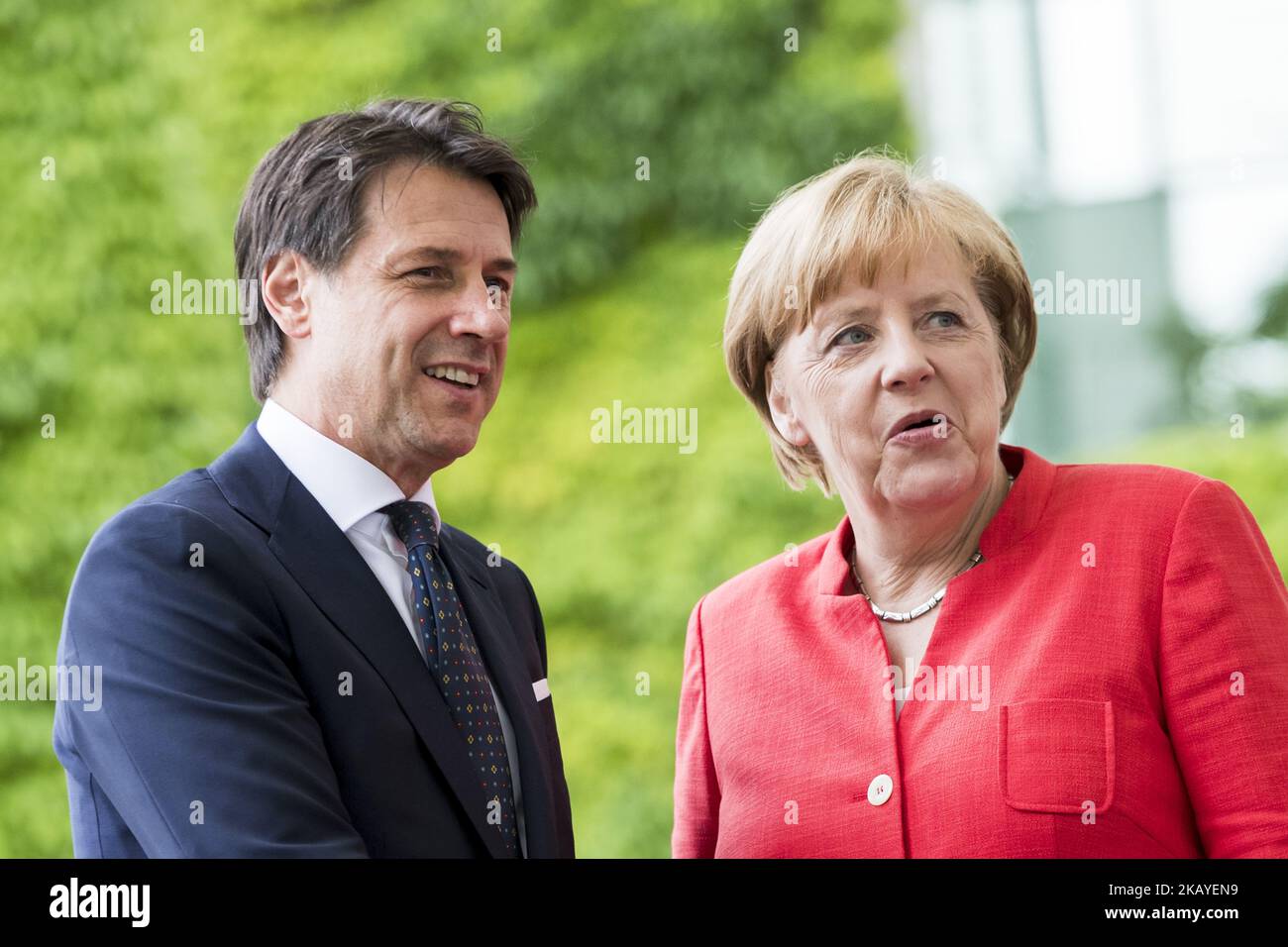 German Chancellor Angela Merkel greets Italian Prime Minister Giuseppe Conte upon his arrival at the Chancellery in Berlin, Germany on June 18, 2018. (Photo by Emmanuele Contini/NurPhoto) Stock Photo