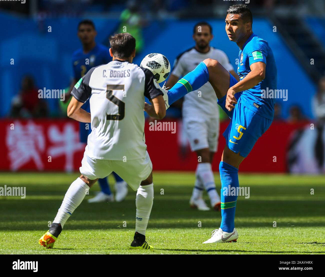 Celso Borges (L) of the Costa Rica national football team and Casemiro of the Brazil national football team vie for the ball during the 2018 FIFA World Cup match, first stage - Group E between Brazil and Costa Rica at Saint Petersburg Stadium on June 22, 2018 in St. Petersburg, Russia. (Photo by Igor Russak/NurPhoto) Stock Photo