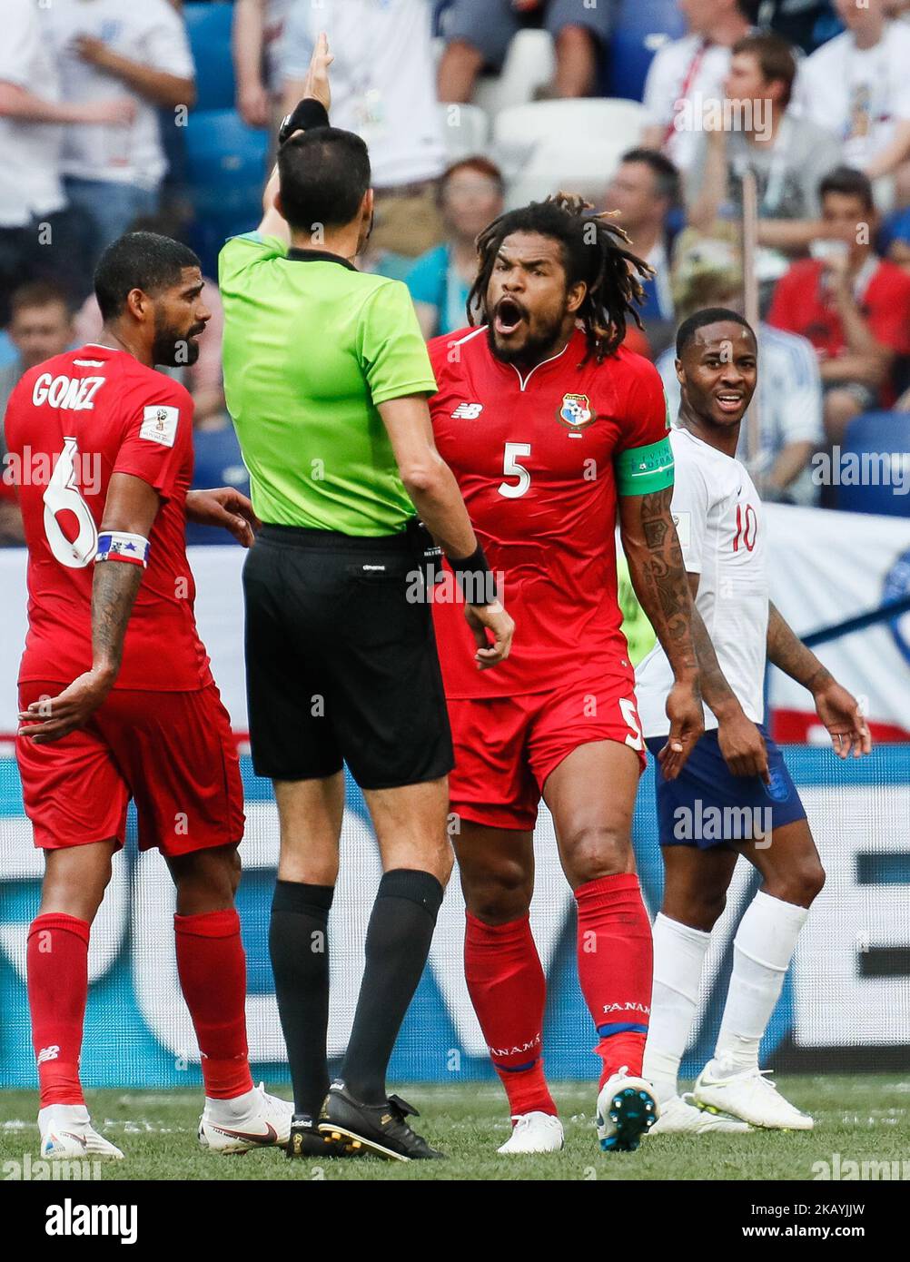Roman Torres (C) of Panama national team argues with the referee Ghead Grisha during the 2018 FIFA World Cup Russia group G match between England and Panama on June 24, 2018 at Nizhny Novgorod Stadium in Nizhny Novgorod, Russia. (Photo by Mike Kireev/NurPhoto) Stock Photo