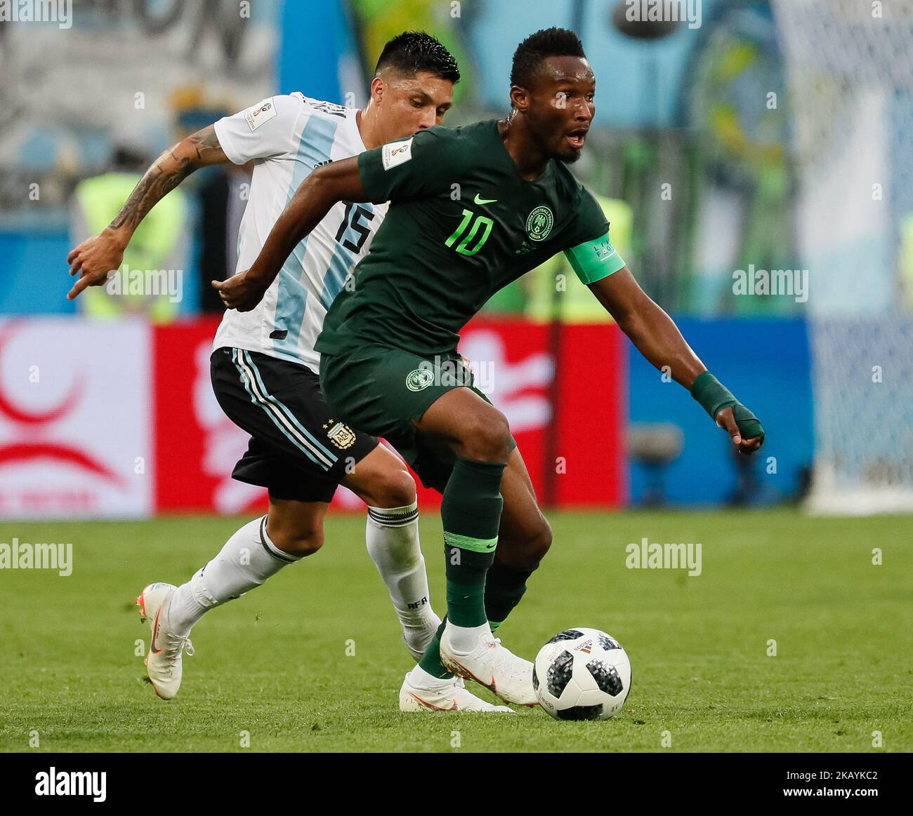 John Obi Mikel (R) of Nigeria national team and Enzo Perez of Argentina national team during the 2018 FIFA World Cup Russia group D match between Nigeria and Argentina on June 26, 2018 at Saint Petersburg Stadium in Saint Petersburg, Russia. (Photo by Mike Kireev/NurPhoto) Stock Photo