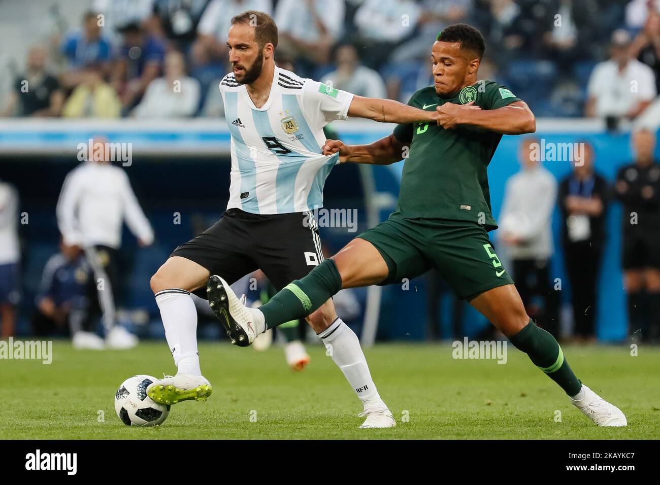 William Ekong (R) of Nigeria national team and Gonzalo Higuain of Argentina national team vie for the ball during the 2018 FIFA World Cup Russia group D match between Nigeria and Argentina on June 26, 2018 at Saint Petersburg Stadium in Saint Petersburg, Russia. (Photo by Mike Kireev/NurPhoto) Stock Photo