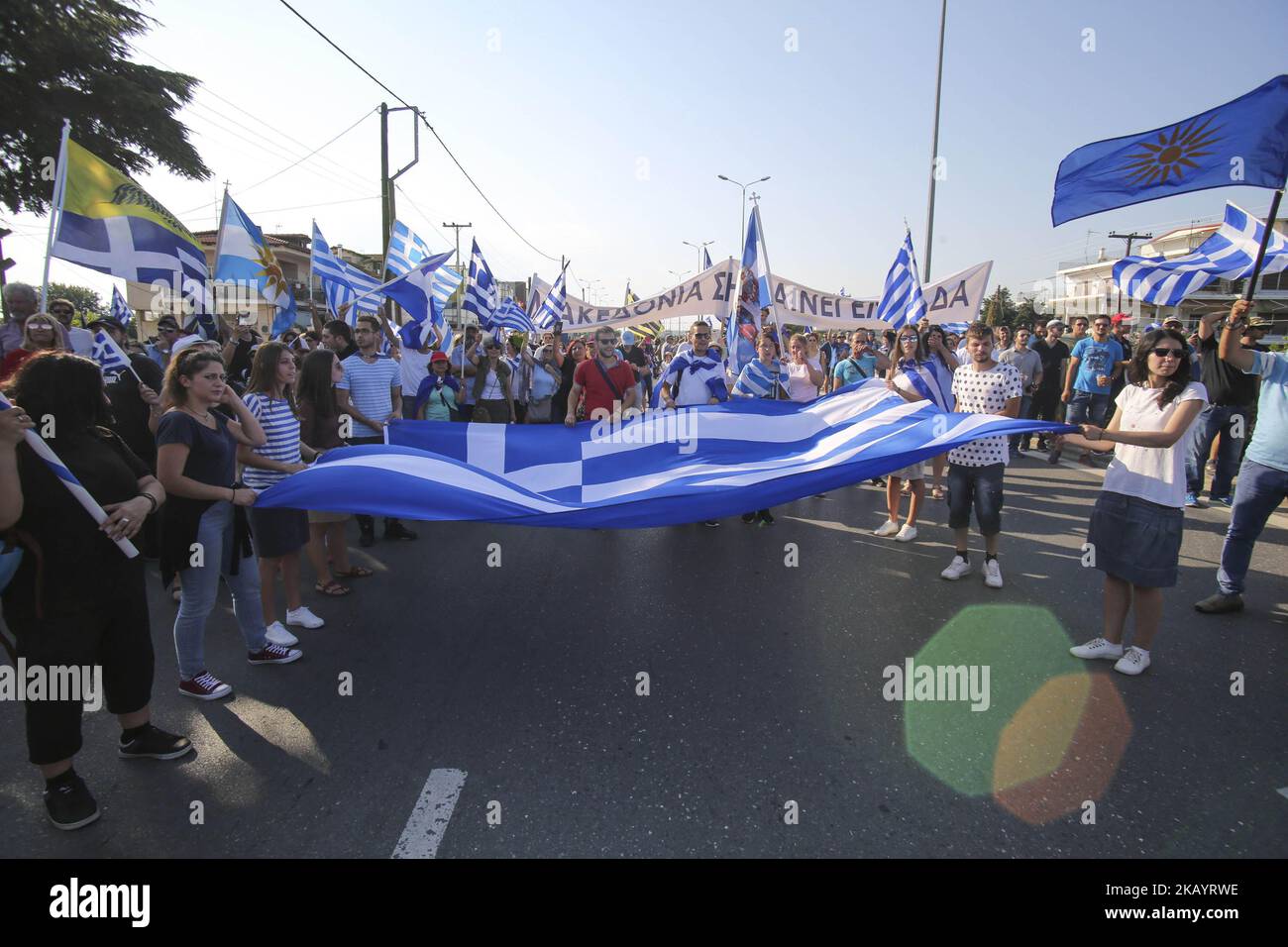 The prime ministers of Greece, Bulgaria, Romania and Serbia held a meeting in Thessaloniki city, Greece, on July 4, 2018. During the meeting, nationalists groups protested and tried to reach the meeting point near the airport where huge police force was developed there. The protest is about the use of the name Macedonia in the neighboring country, FYROM. The protest continued in Thessaloniki city after a fight with some anarchists. The protest passed in front of the Holocaust memorial and some people threw bottles. Traffic was stopped in many locations in the city due to the protest, from 17:0 Stock Photo