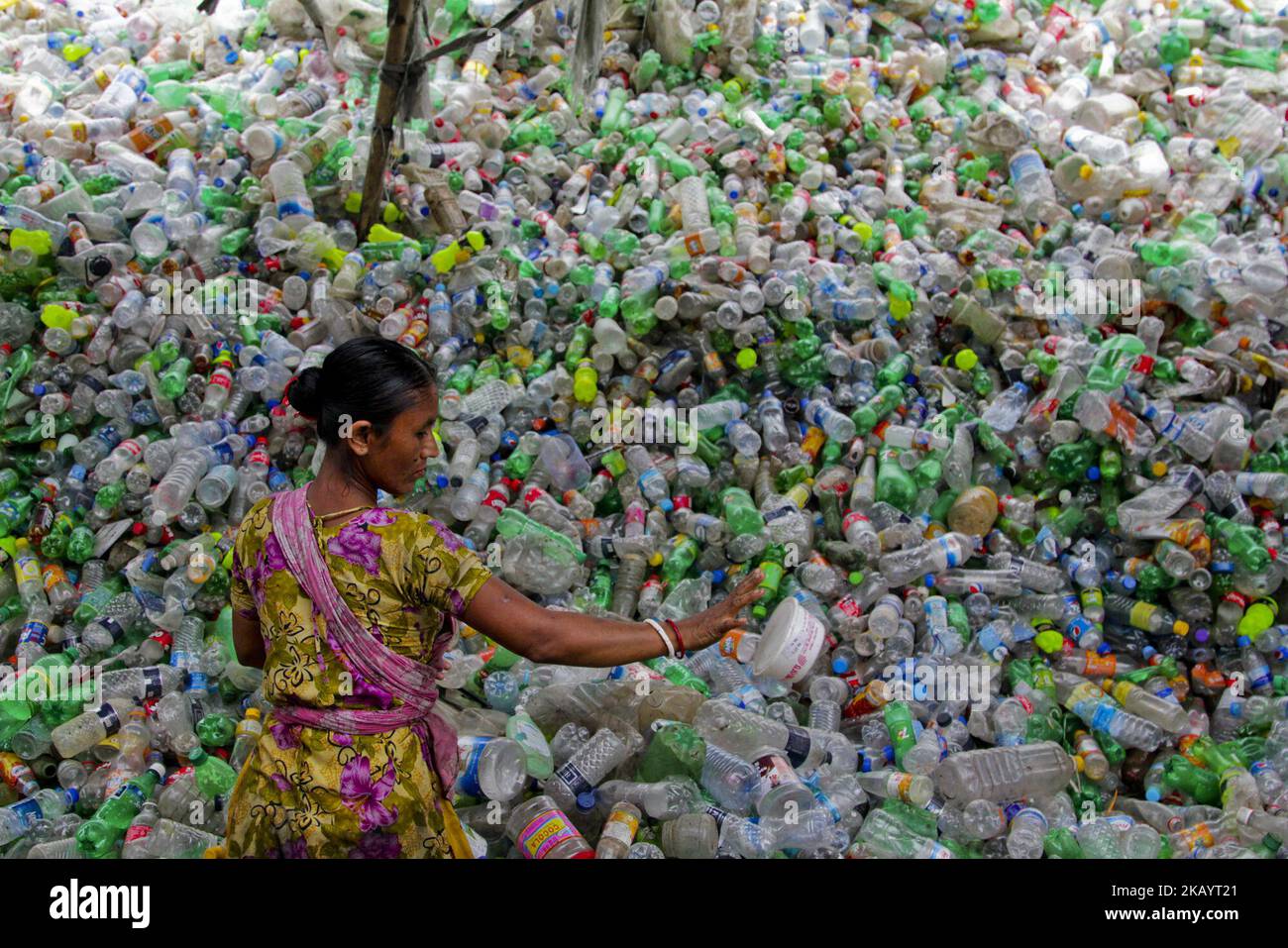 People at work in Plastic recycling factory, in Dhaka, Bangladesh, on