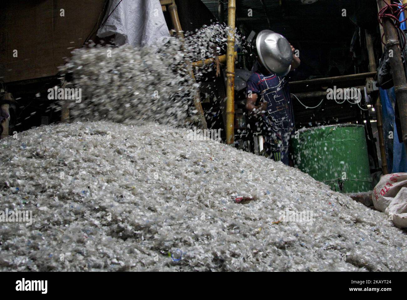 People at work in Plastic recycling factory, in Dhaka, Bangladesh, on