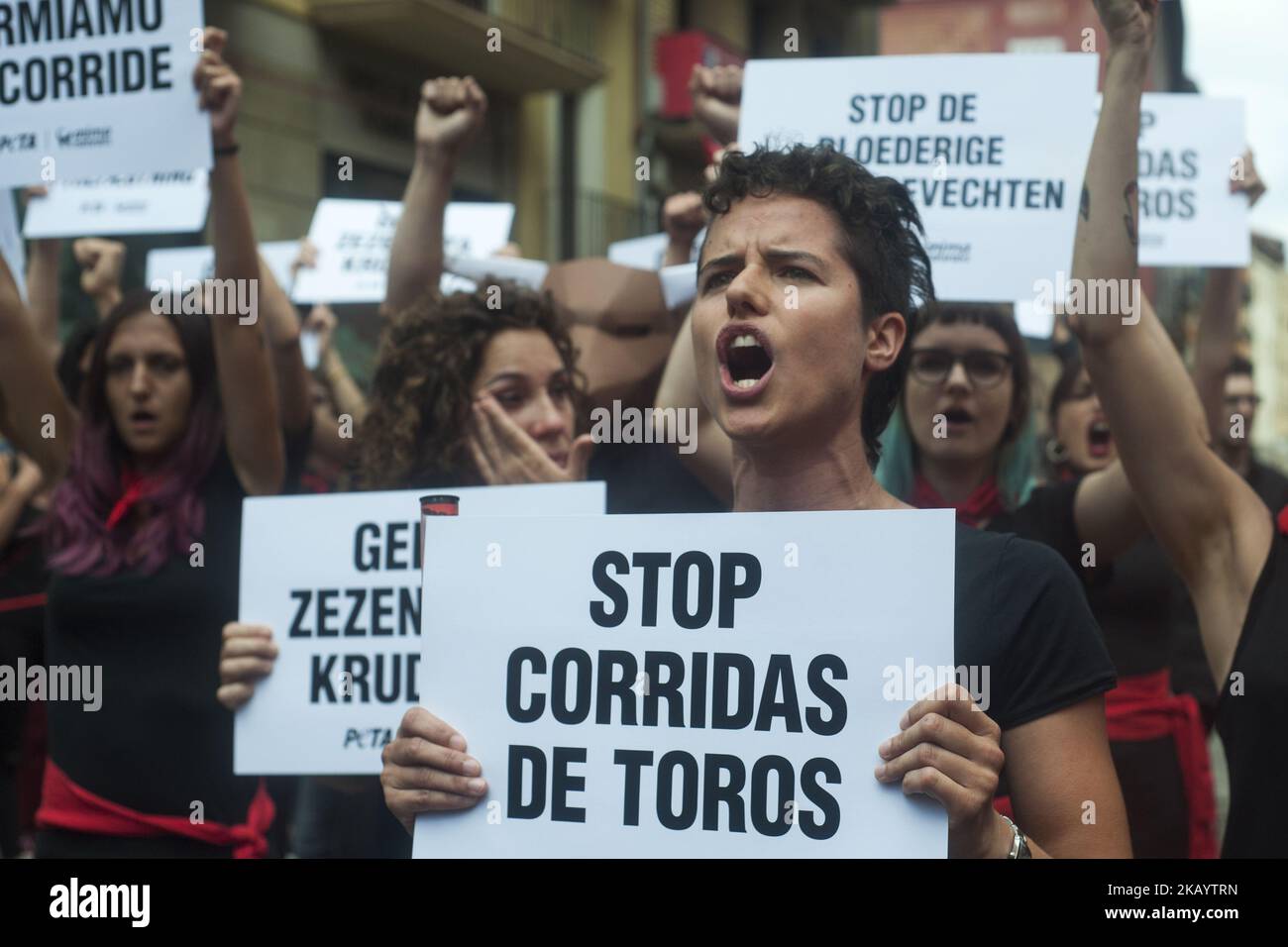 A young girl from the PETA collective shouts anti-bullfighting slogans during her protest in the Plaza del Ayuntamiento in Pamplona on the occasion of the San Fermin festival , on July 5, 2018. (Photo by Joaquin Gomez Sastre/NurPhoto) Stock Photo
