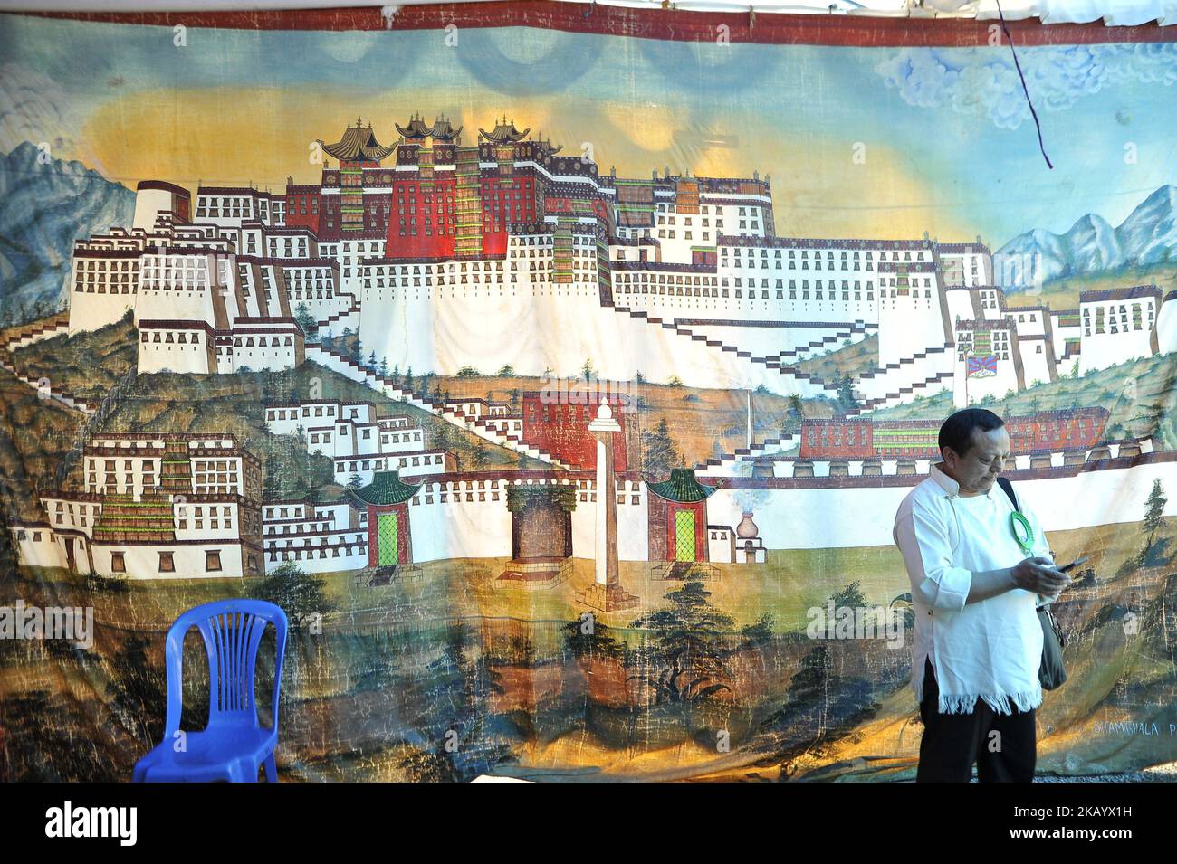 Tibetan people taking pictures infornt of potala palace poster during 83rd birthday celebration of the exiled spiritual leader the Dalai Lama in Lalitpur, Nepal on Friday, July 06, 2018. (Photo by Narayan Maharjan/NurPhoto) Stock Photo