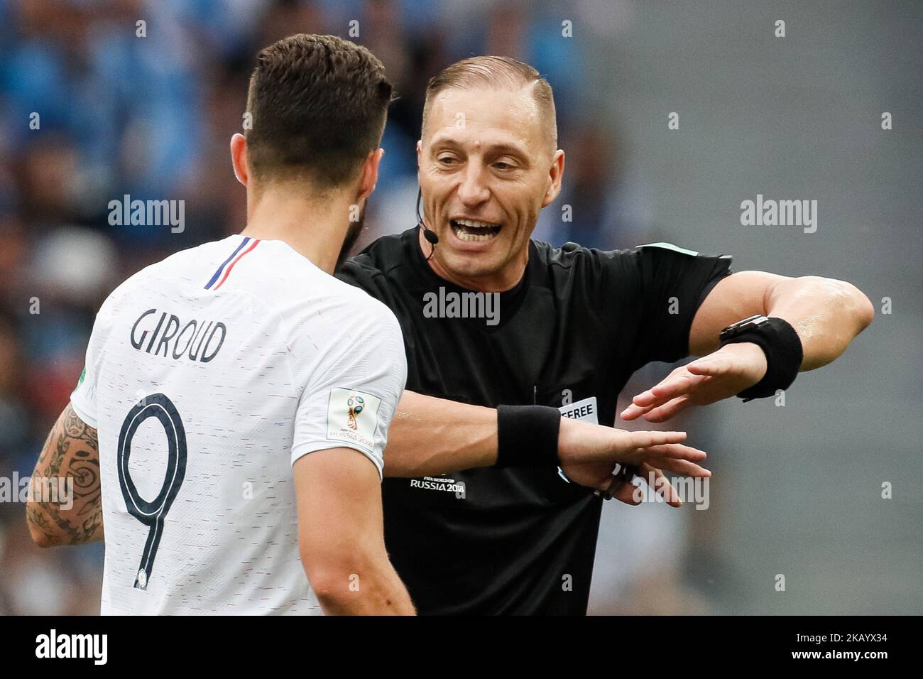Referee Nestor Pitana (R) talks to Olivier Giroud of France national team during the 2018 FIFA World Cup Russia Quarter Final match between Uruguay and France on July 6, 2018 at Nizhny Novgorod Stadium in Nizhny Novgorod, Russia. (Photo by Mike Kireev/NurPhoto) Stock Photo