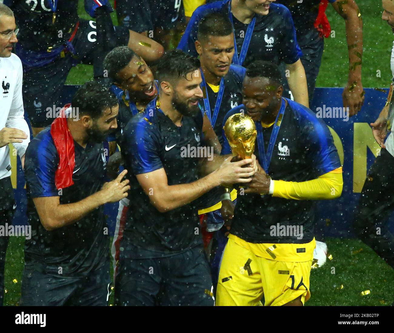 France v Croatia - FIFA World Cup Russia 2018 Final Olivier Giroud (France) and Steve Mandanda (France) kiss the trophy at Luzhniki Stadium in Moscow, Russia on July 15, 2018. (Photo by Matteo Ciambelli/NurPhoto)  Stock Photo