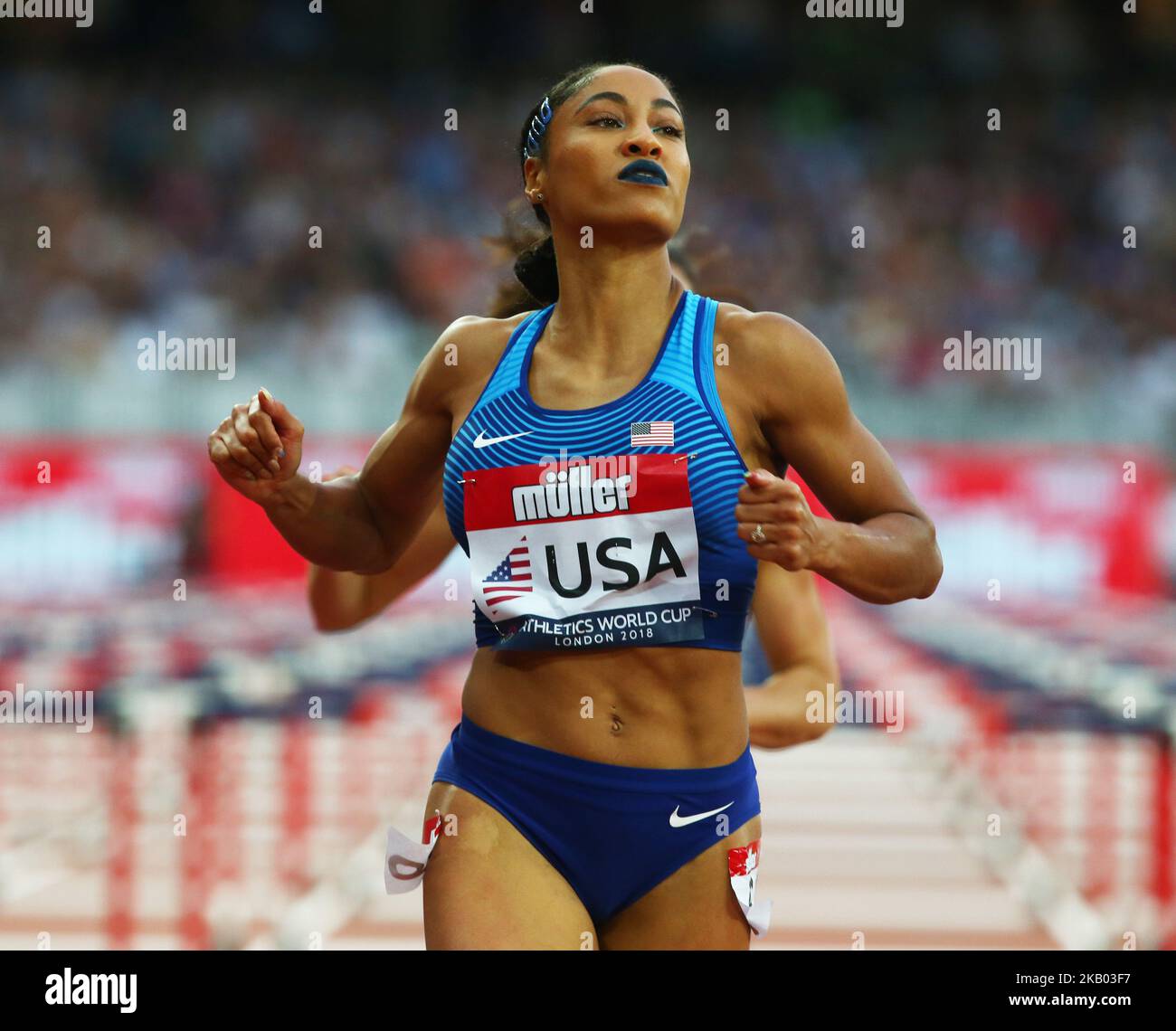 Queen Harrison of USA compete in the 100m Hurdles Women during