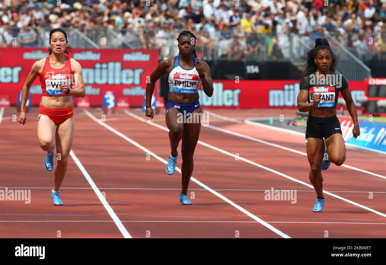 L-R Yongli Wei People's Republic of China Asha Philip of Great Britain and Northern Ireland and Dezerea Bryant of USA compete in the 100m Women Heat B during the Muller Anniversary Games IAAF Diamond League Day One at The London Stadium on July 21, 2018 in London, England. (Photo by Action Foto Sport/NurPhoto)  Stock Photo