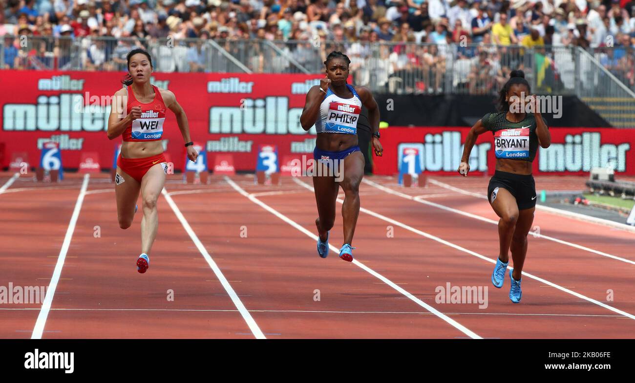 L-R Yongli Wei People's Republic of China Asha Philip of Great Britain and Northern Ireland and Dezerea Bryant of USA compete in the 100m Women Heat B during the Muller Anniversary Games IAAF Diamond League Day One at The London Stadium on July 21, 2018 in London, England. (Photo by Action Foto Sport/NurPhoto)  Stock Photo