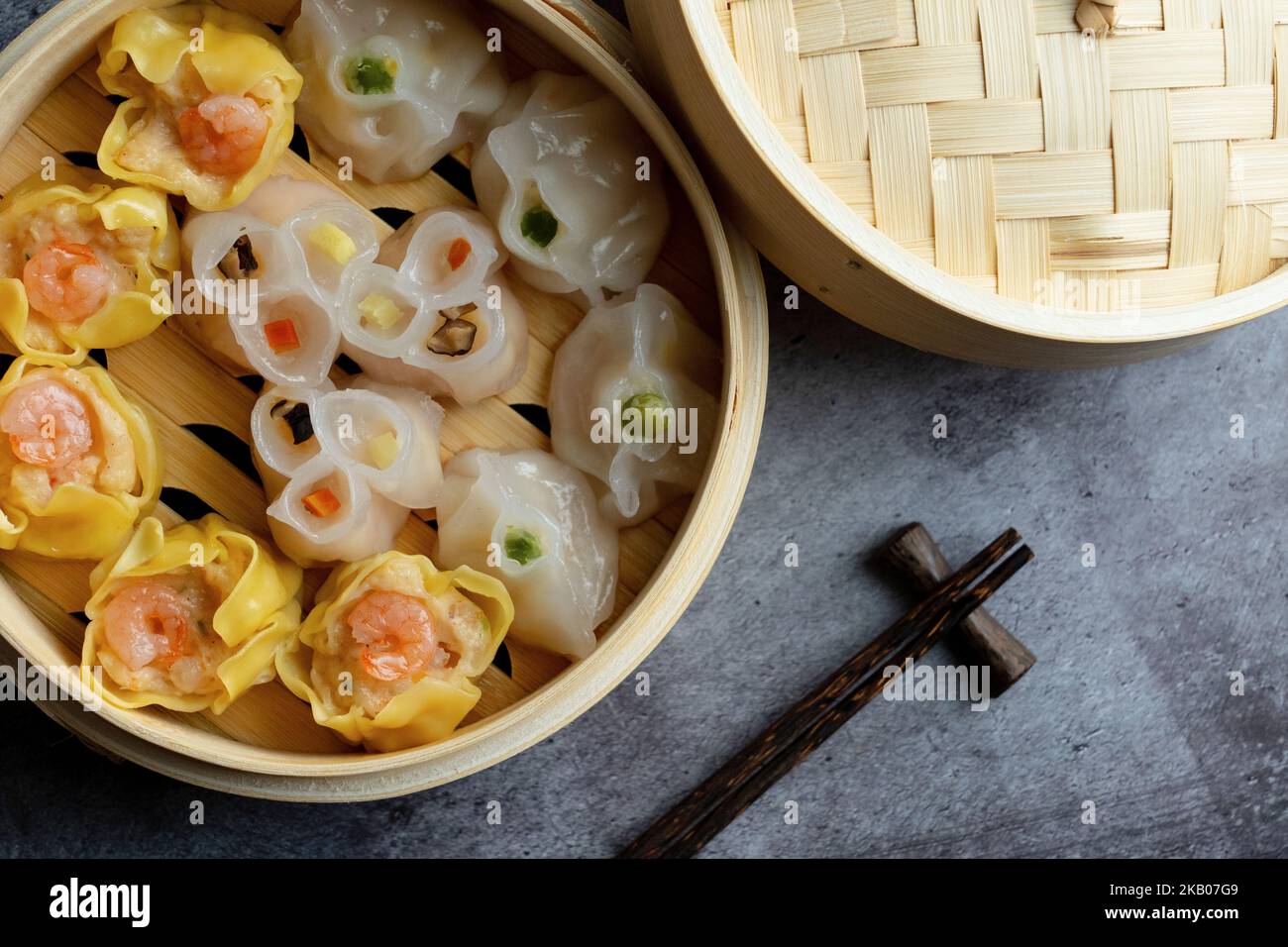 Dim Sum mix steamed in bamboo wood basket.large range of small Chinese