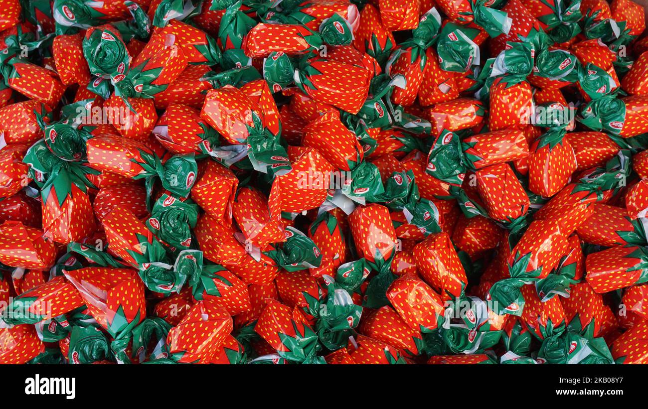 candies wrapped in red and green wraps Stock Photo