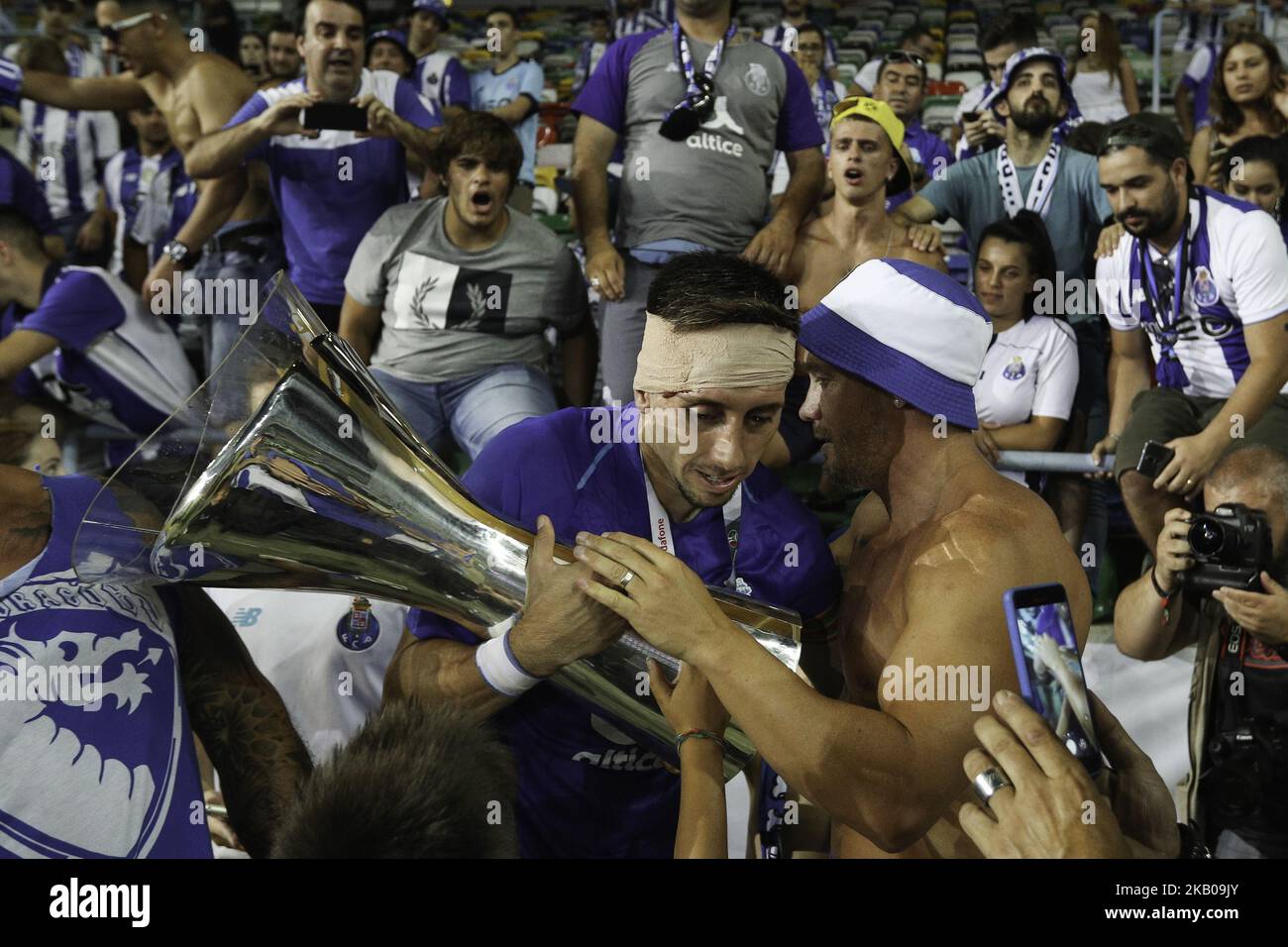 Porto's Mexican midfielder Hector Herrera celebrating with trophy after wining the Candido Oliveira Super Cup match between FC Porto and CD Aves, at Municipal de Aveiro Stadium on August 4, 2018 in Aveiro, Portugal. (Photo by Paulo Oliveira / DPI / NurPhoto) Stock Photo