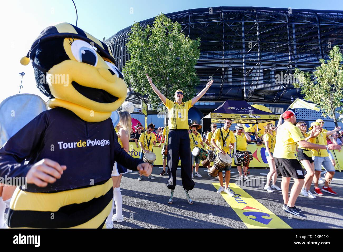 Public and mascots celebrate the third day of Tour de Pologne on the finish line of third stage of the race in Zabrze, Poland on August 6, 2018. (Photo by Dominika Zarzycka/NurPhoto) Stock Photo