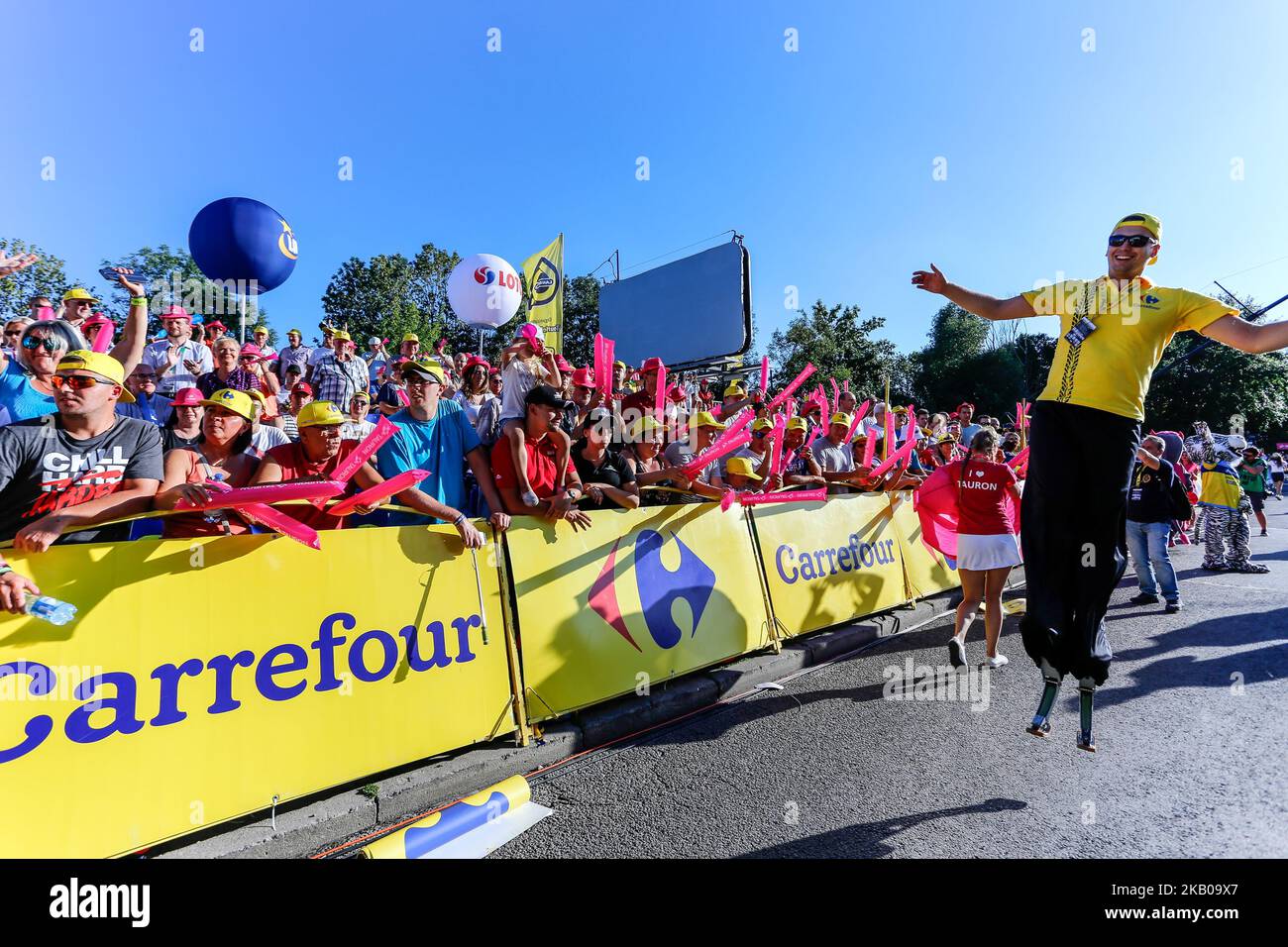 Public and mascots celebrate the third day of Tour de Pologne on the finish line of third stage of the race in Zabrze, Poland on August 6, 2018. (Photo by Dominika Zarzycka/NurPhoto) Stock Photo