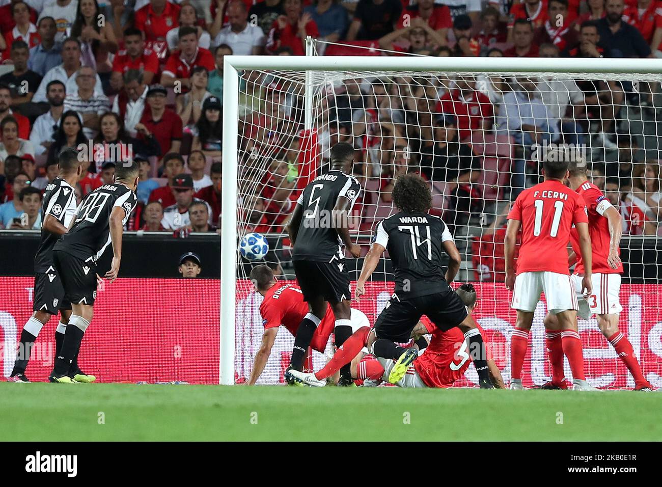 PAOK's midfielder Amr Warda (74) from Egypt shoots to score during the UEFA  Champions League play-off first leg match SL Benfica vs PAOK FC at the Luz  Stadium in Lisbon, Portugal on