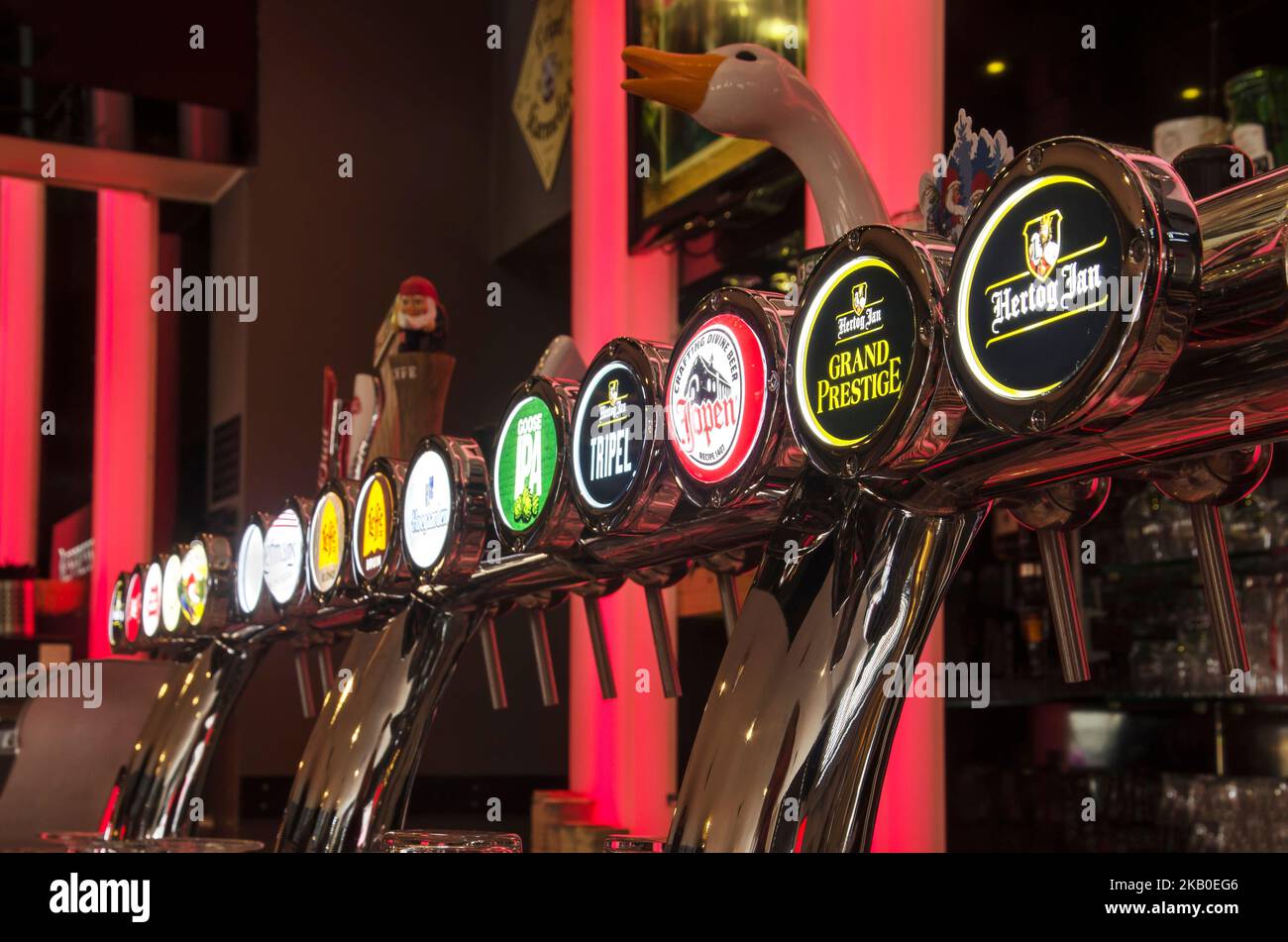Bergen op Zoom, The Netherlands, December 29, 2019: array of beer pumps in a bar with various Dutch and Belgian craft beers on draught Stock Photo