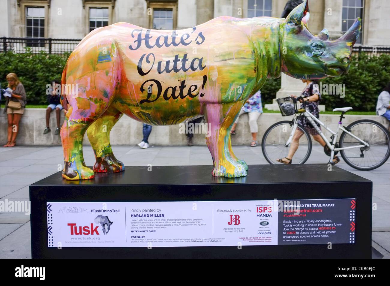 A 300kg rhino sculpture painted by Harland Miller is pictured in London on August 22, 2018. The sculpture hits the streets as part of the Tusk Rhino Trail in London, a City-wide installation to raise funds for the protection of rhinos in Africa. (Photo by Alberto Pezzali/NurPhoto) Stock Photo