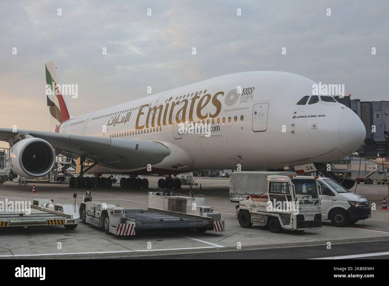 Emirates Airbus A380 docked at Dusseldorf Airport in Germany on August 21, 2018. The double-decker airplane as seen during the golden hour in Dusseldorf airport. Emirates operates 2 daily flights with A380 from Dubai International DXB airport, UAE to Dusseldorf International, DUS airport, Germany, flights EK55 and return to Dubai EK 56 and EK57 and return EK 58. Emirates is the largest Airbus A380-800 operator with a fleet of 104 airplanes and 58 more in order. (Photo by Nicolas Economou/NurPhoto) Stock Photo