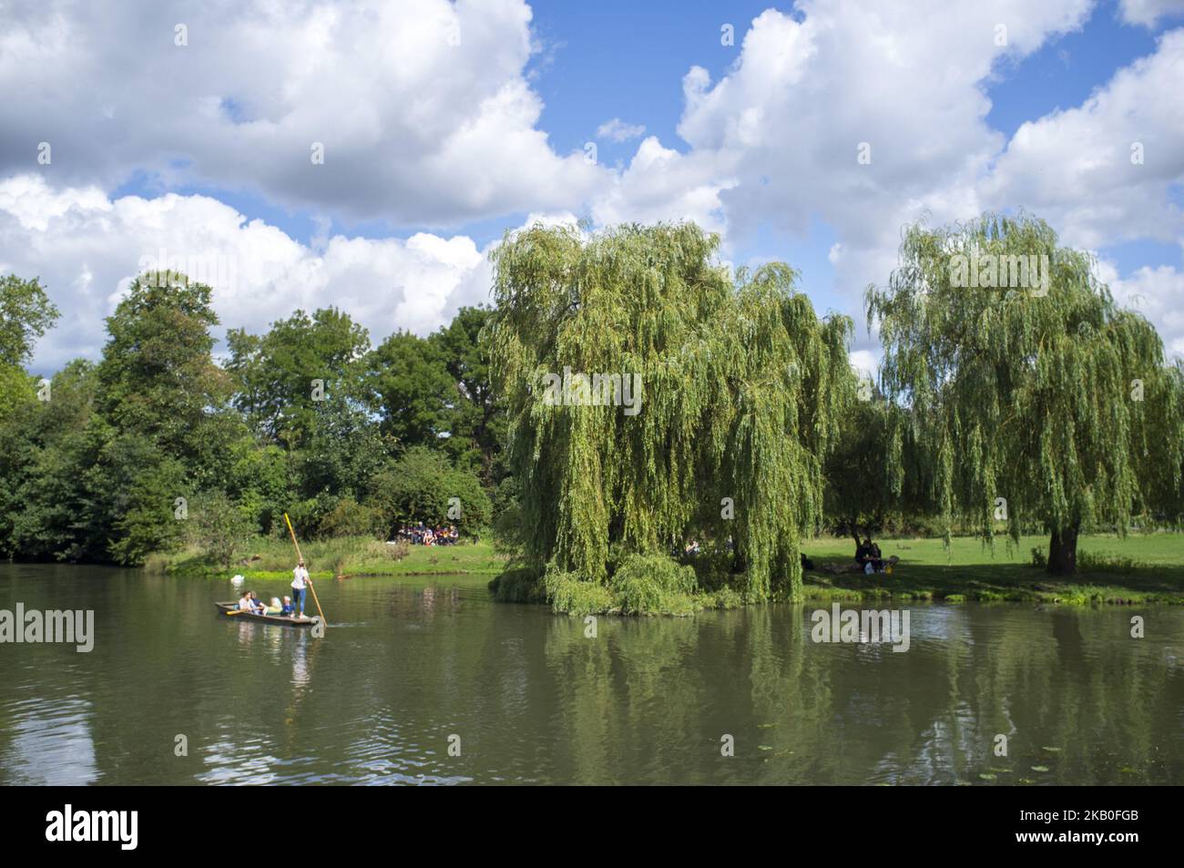 Boats on the river Cam are pictured in Cambridge, on August 25, 2018. Cambridge is home to the world-renowned University of Cambridge, which was founded in 1209. The university includes King's College Chapel, Cavendish Laboratory, and the Cambridge University Library, one of the largest legal deposit libraries in the world. The city's skyline is dominated by several college buildings, along with the spire of the Our Lady and the English Martyrs Church, the chimney of Addenbrooke's Hospital and St John's College Chapel tower. Anglia Ruskin University, evolved from the Cambridge School of Art an Stock Photo