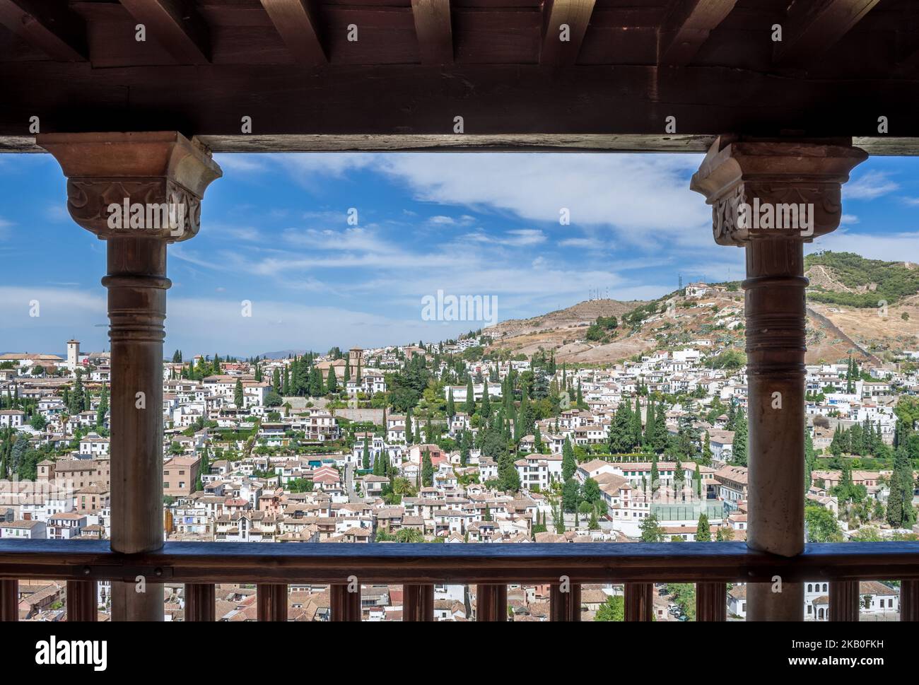 View of Granada city from the glorious Alhamra (Alhambra) Palace. The magnificent structure was built in 889 AD during the Muslim rule over Spain. Stock Photo