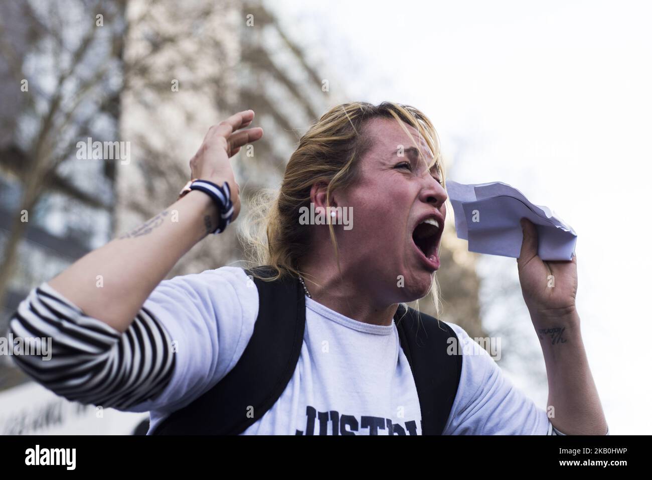 A woman shouts anti-goverment slogan during the fourth national protest against 'gatillo fÃ¡cil' and police repression in Buenos Aires, Argentina on August 27 2018. (Photo by Gala Abramovich/NurPhoto) Stock Photo